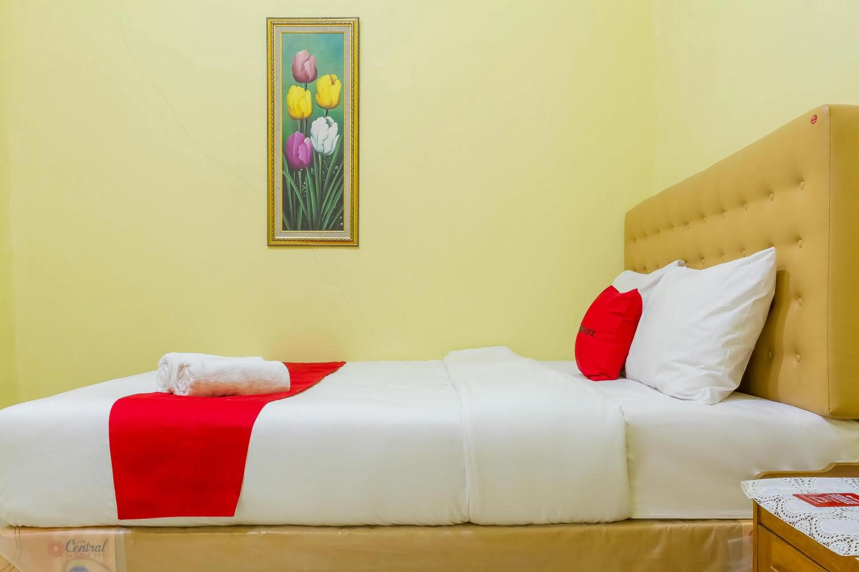 Bed in RedDoorz Syariah @ Puri Kalijaga Street