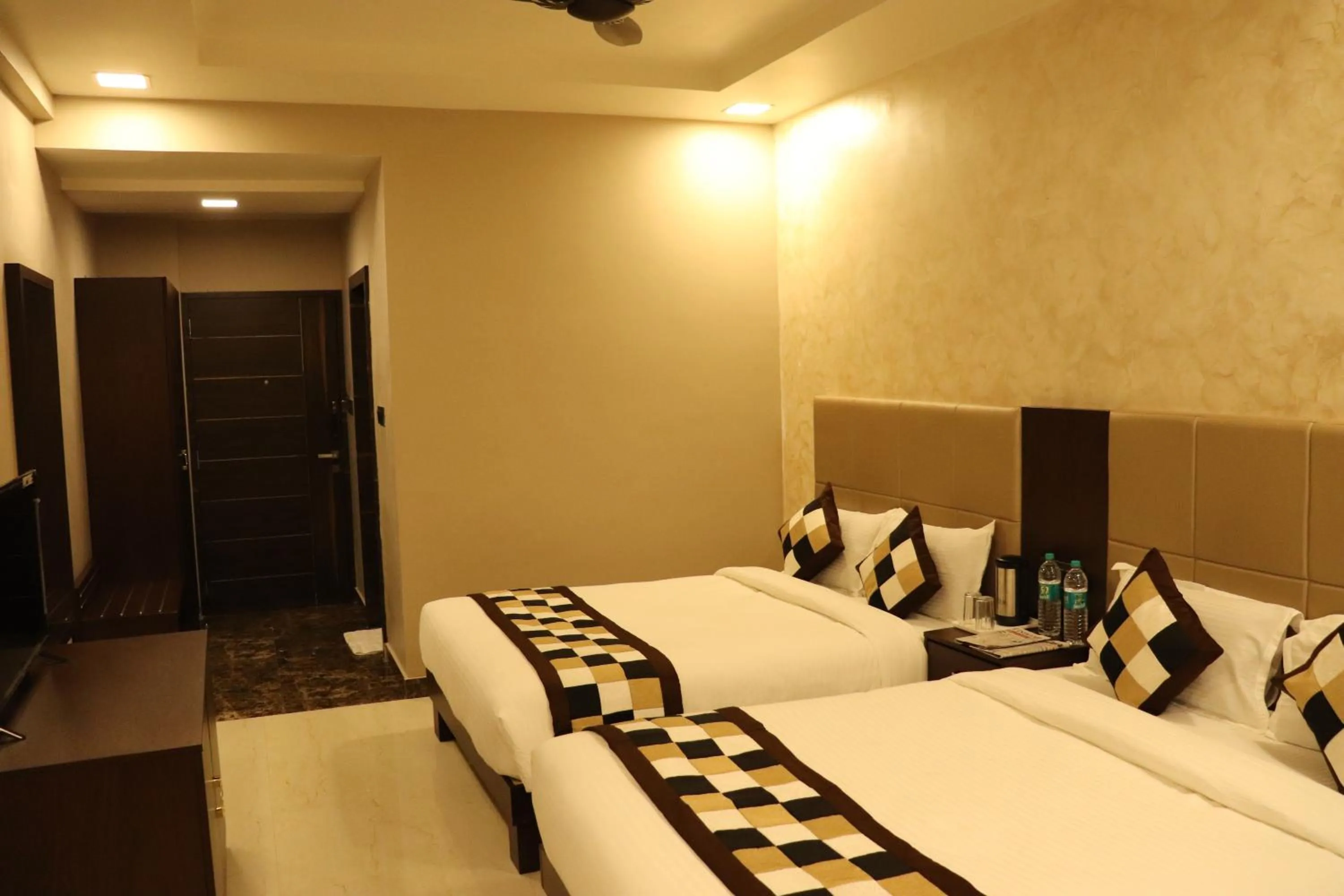 Bed in Mangal Grand Hotel