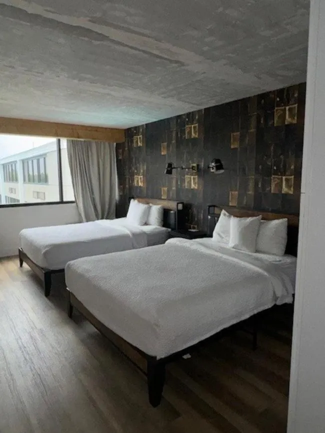 Photo of the whole room in Ramada Plaza by Wyndham Charlotte South End Airport