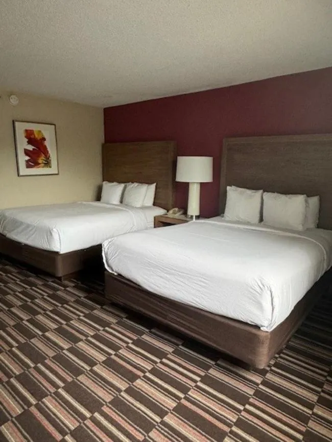 Photo of the whole room in Ramada Plaza by Wyndham Charlotte South End Airport