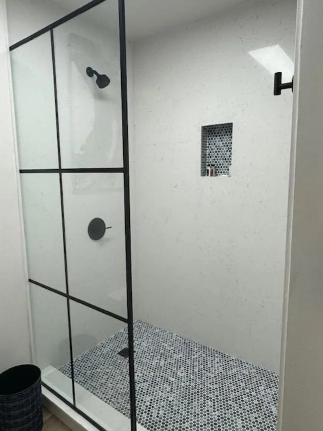 Bathroom in Ramada Plaza by Wyndham Charlotte South End Airport