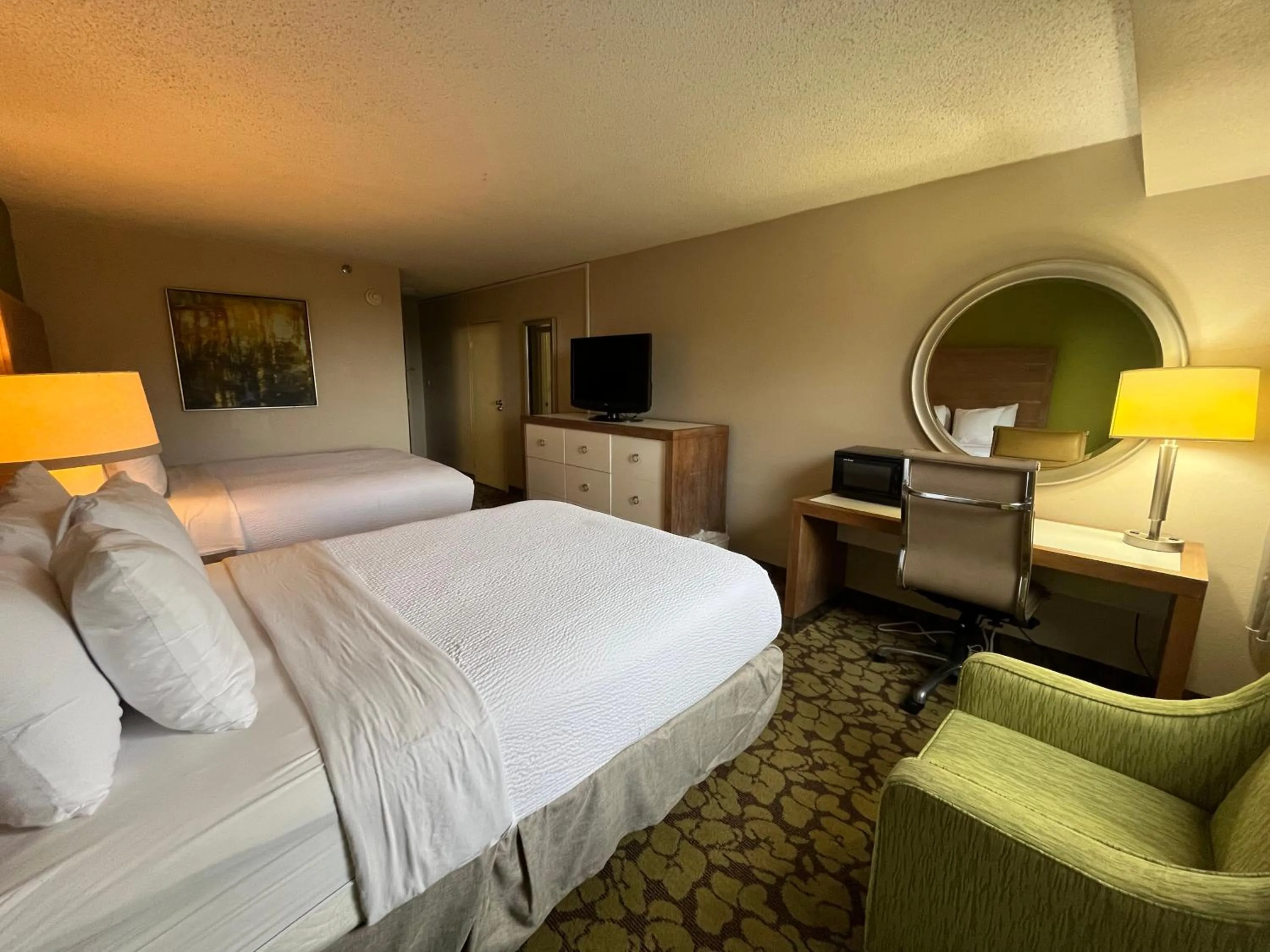 Photo of the whole room in Ramada Plaza by Wyndham Charlotte South End Airport