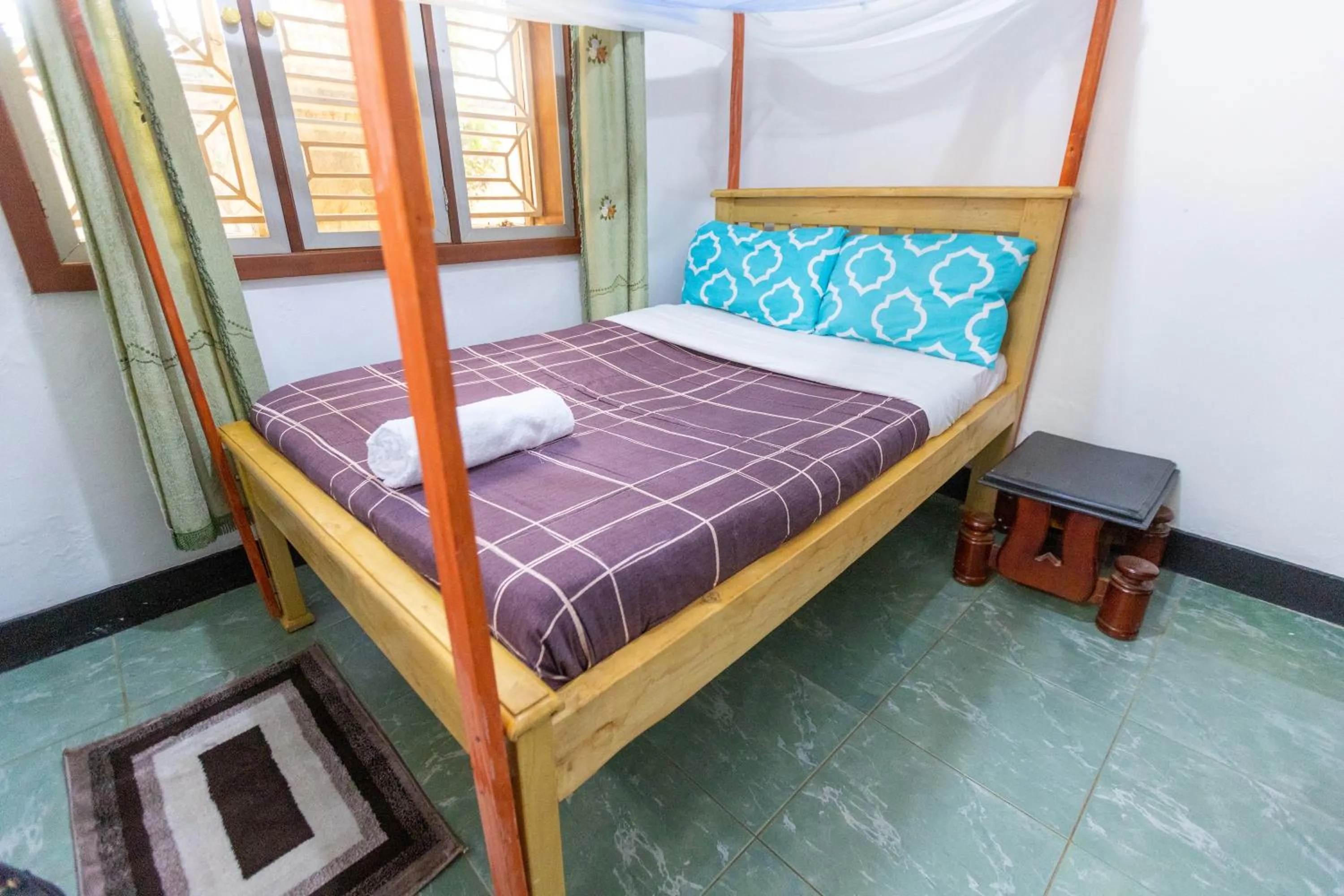 Bed in Acacia Villa Kampala