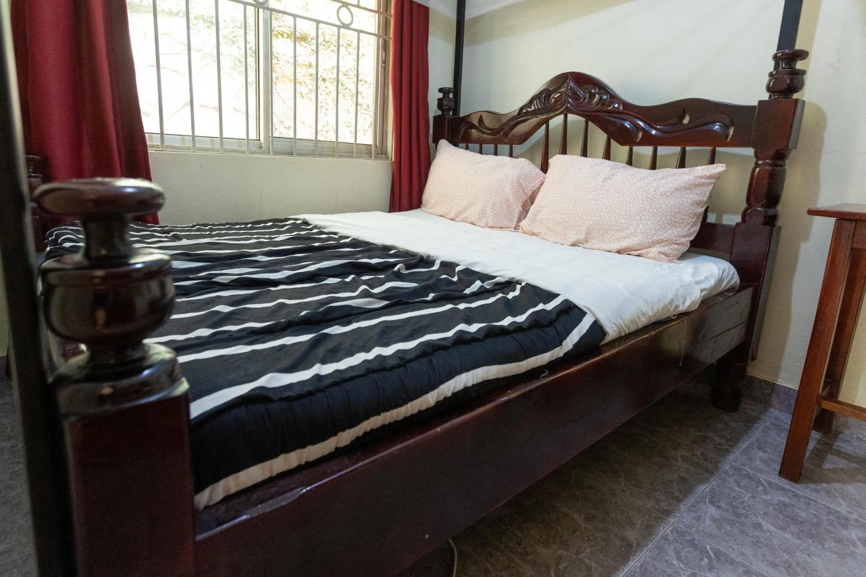 Bed in Acacia Villa Kampala