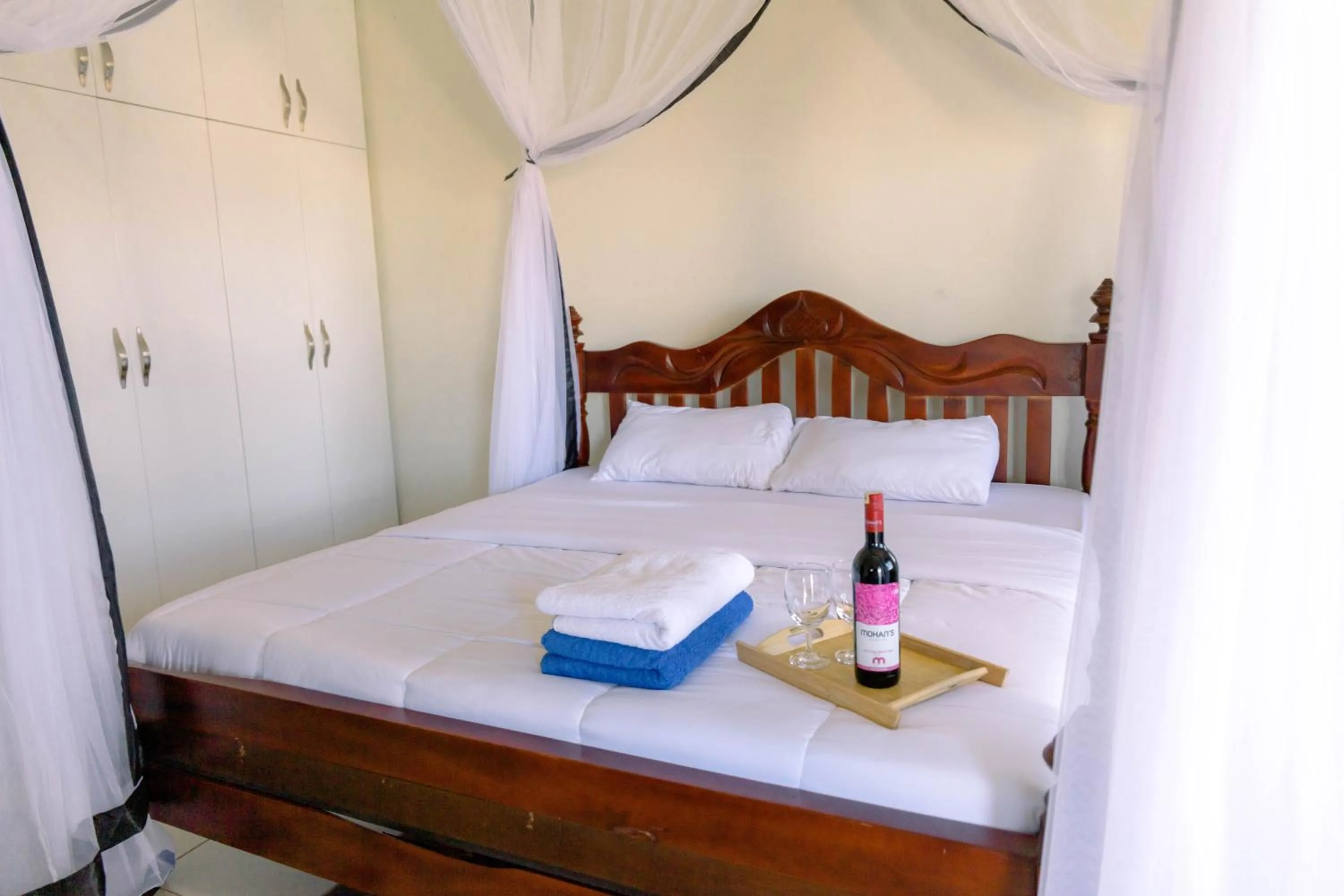 Bed in Acacia Villa Kampala