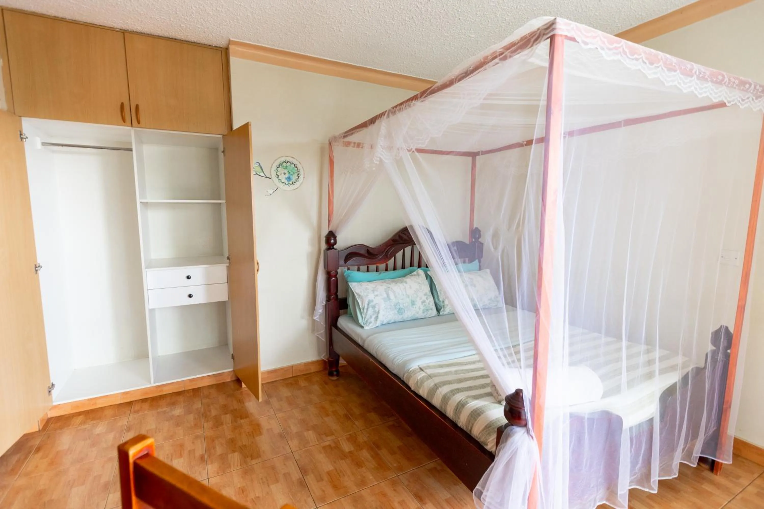 Bed in Acacia Villa Kampala