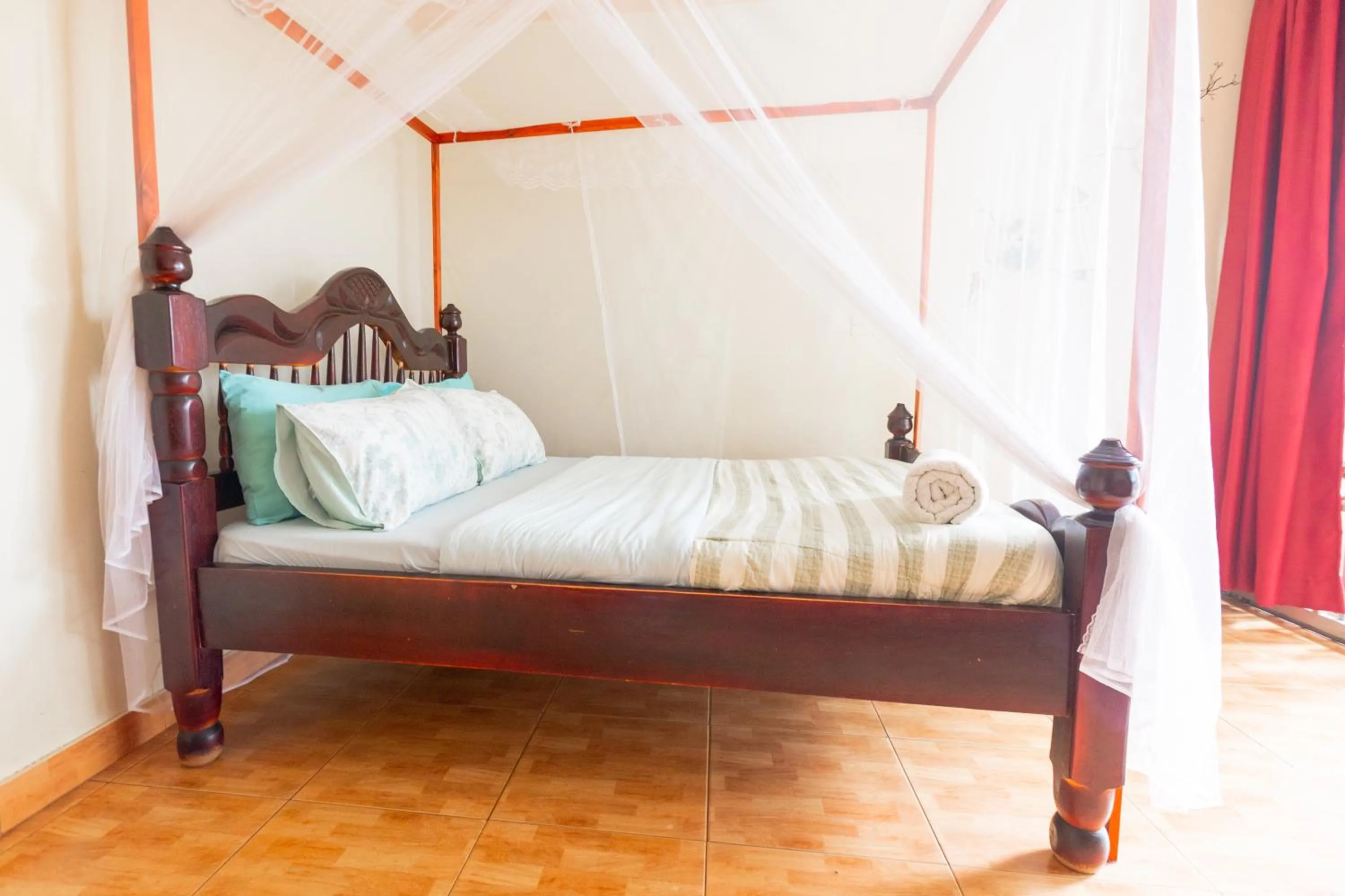 Bed in Acacia Villa Kampala