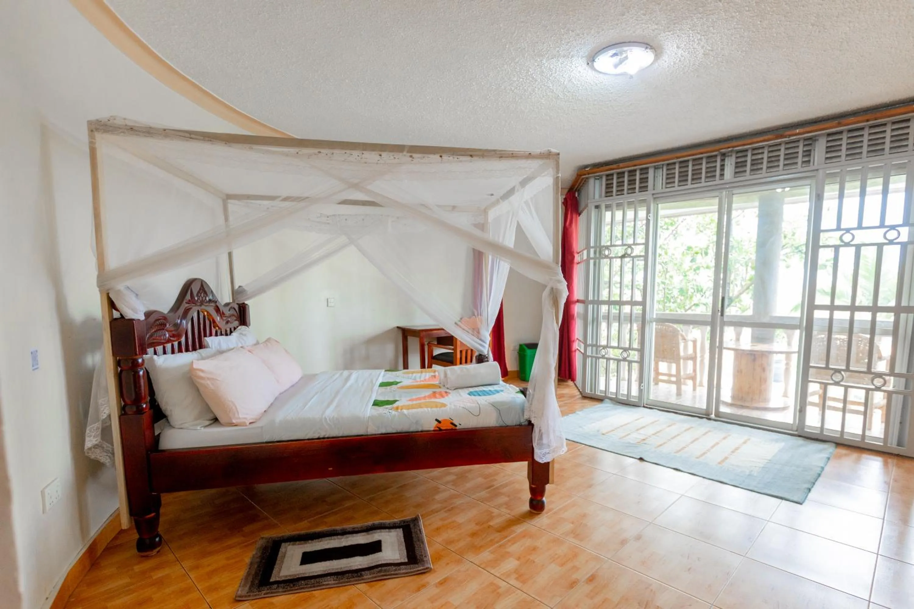 Bed in Acacia Villa Kampala