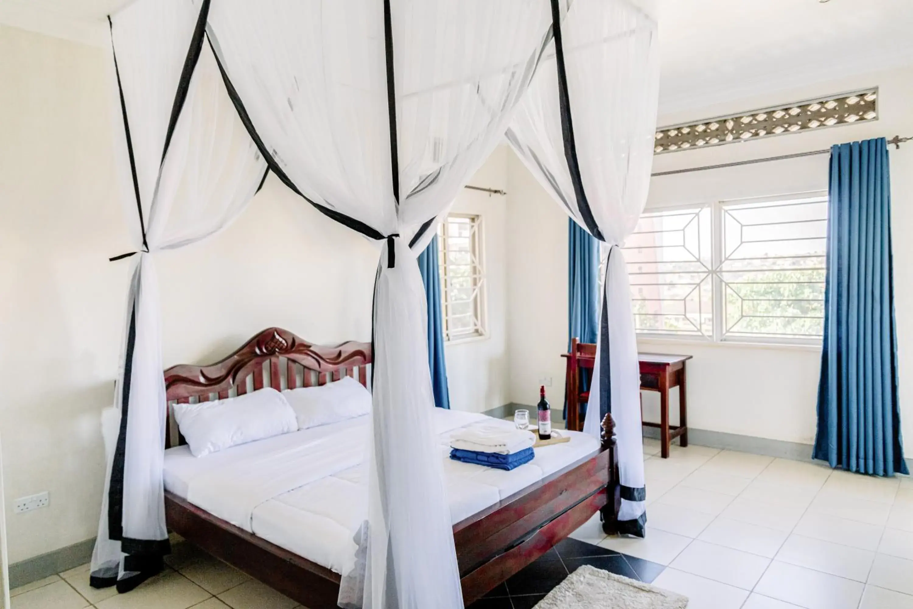King Suite with Balcony - single occupancy in Acacia Villa Kampala King Suite with Balcony - single occupancy in Acacia Villa Kampala