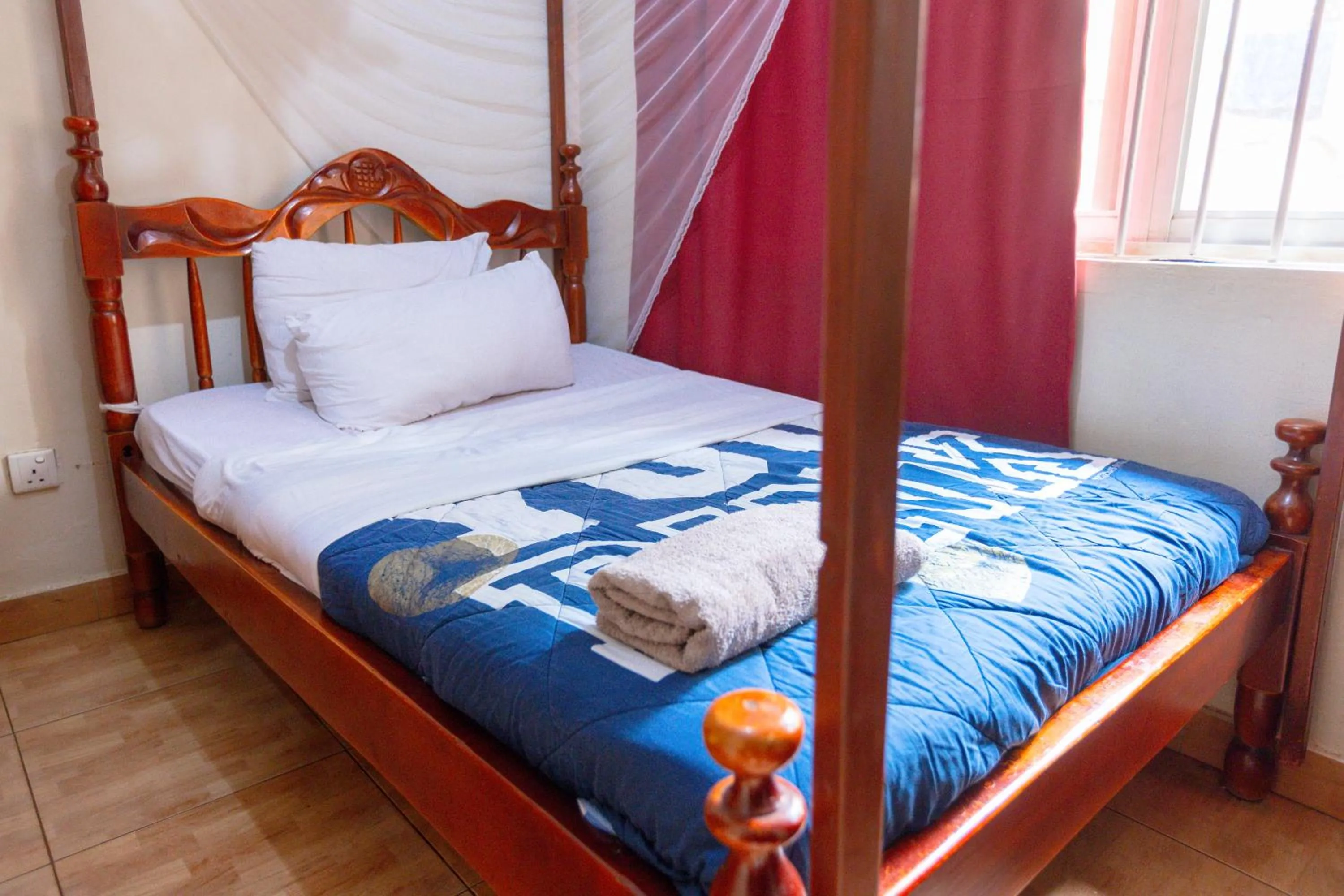 Bed in Acacia Villa Kampala