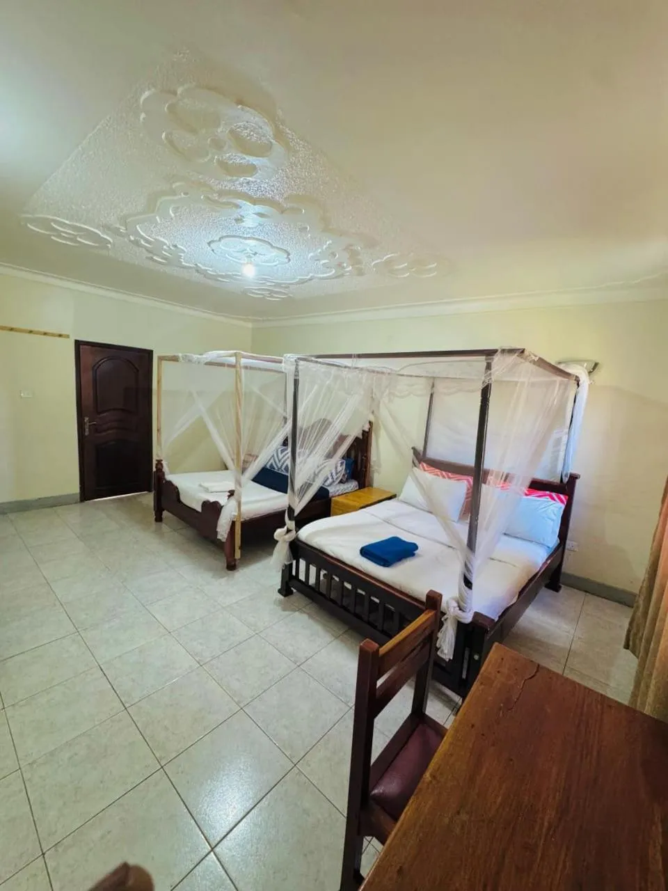 Quadruple Room with Shared Bathroom - single occupancy in Acacia Villa Kampala