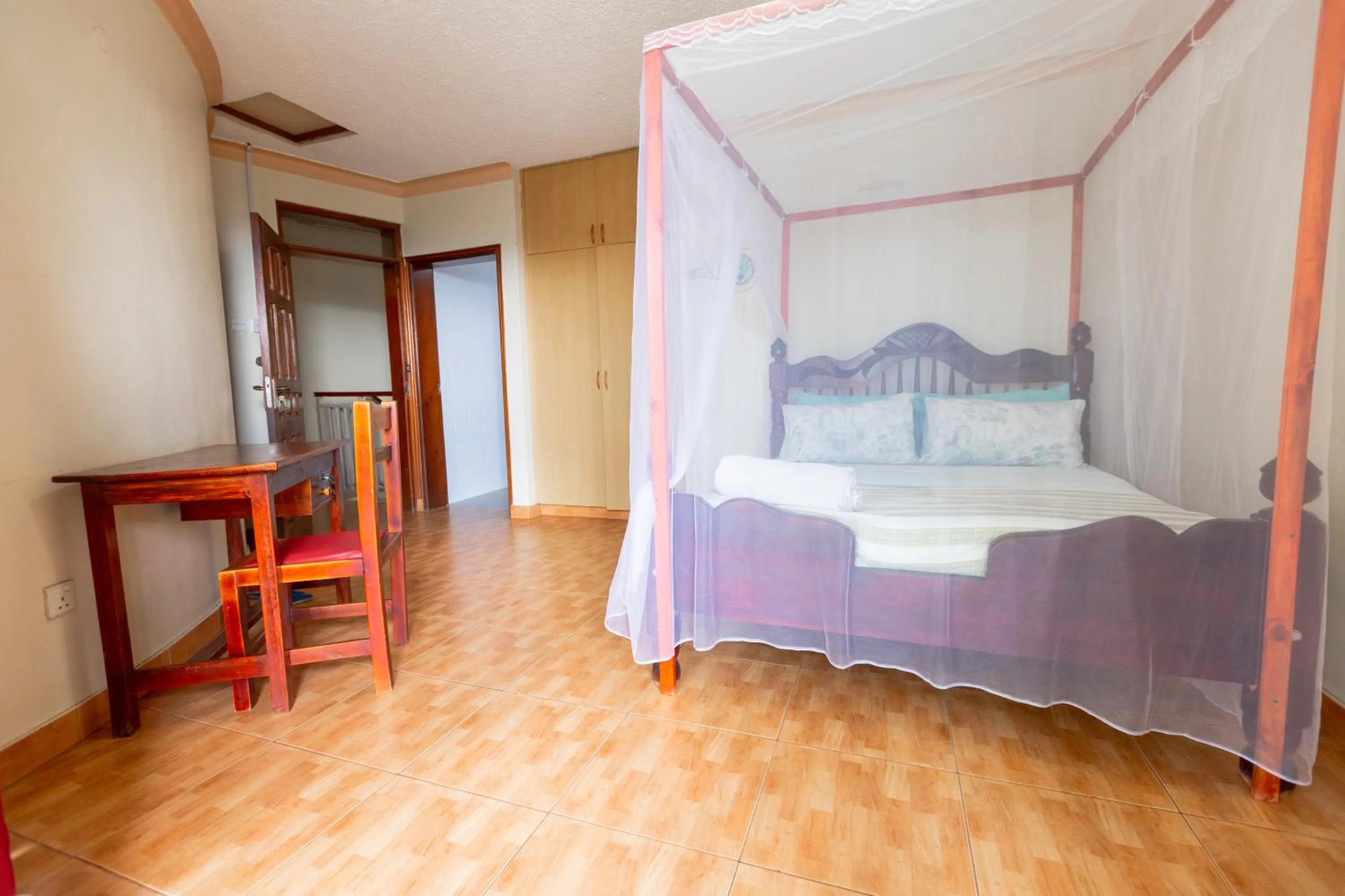 Bed in Acacia Villa Kampala