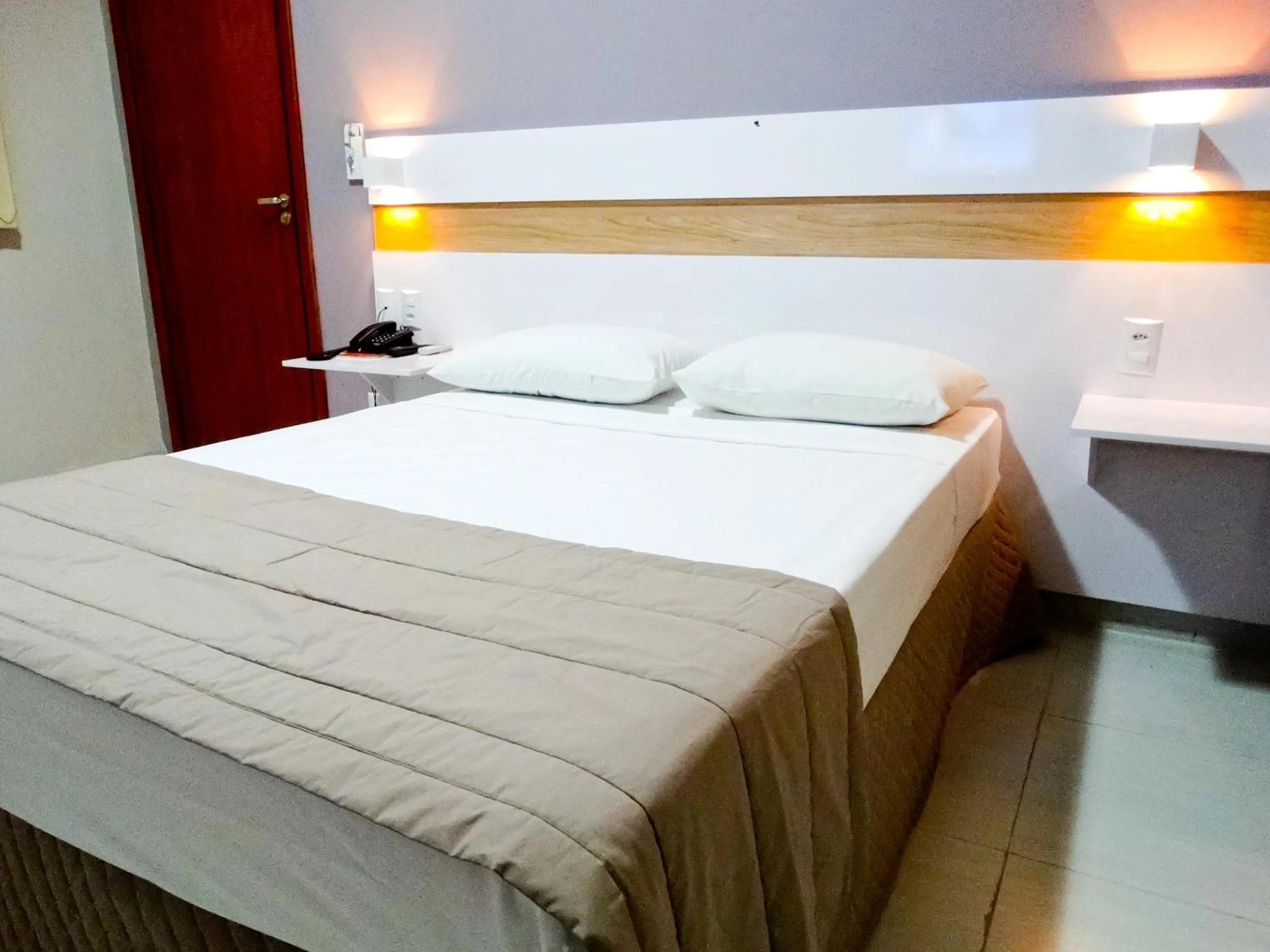 Bed in Riviera Pantanal Hotel