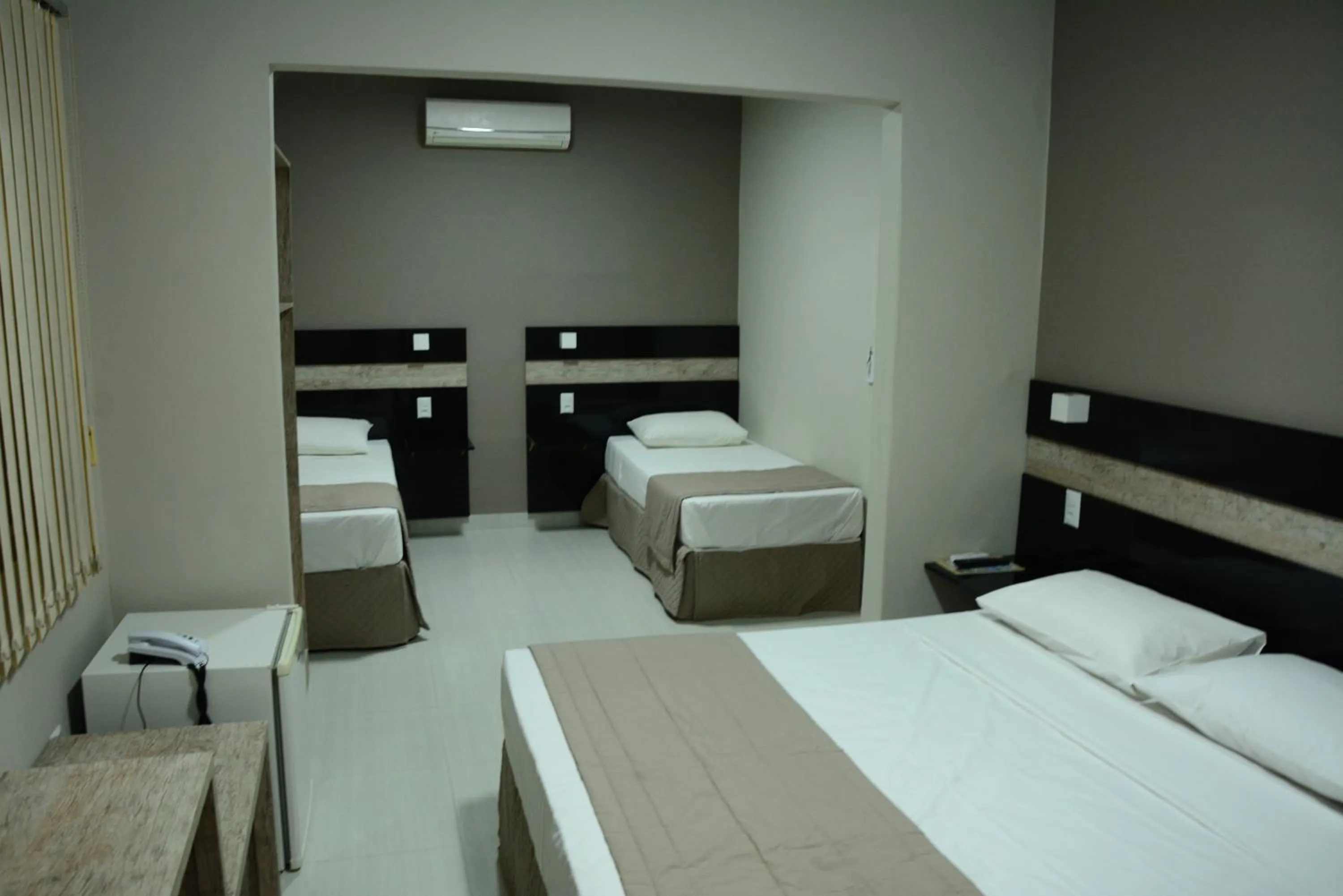 Bed in Riviera Pantanal Hotel