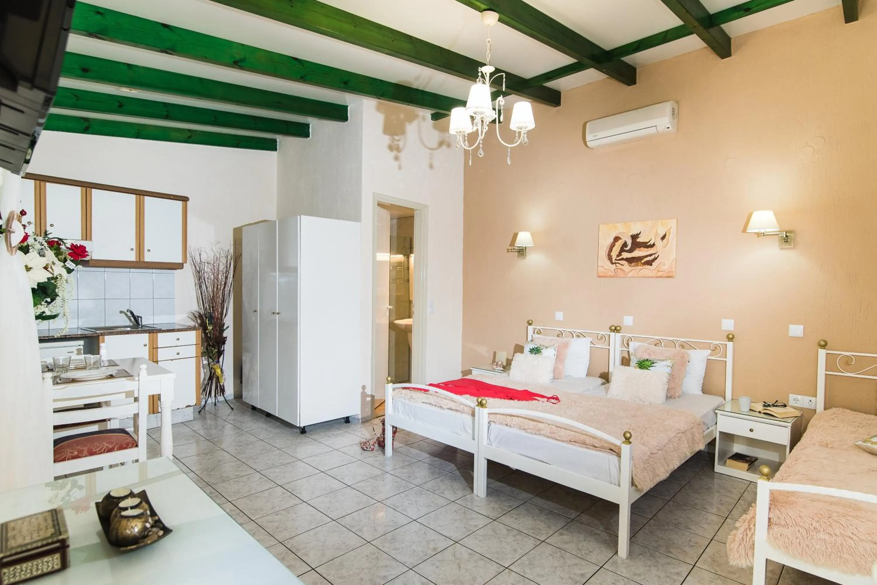 Photo of the whole room, Bed in Oasis Studios