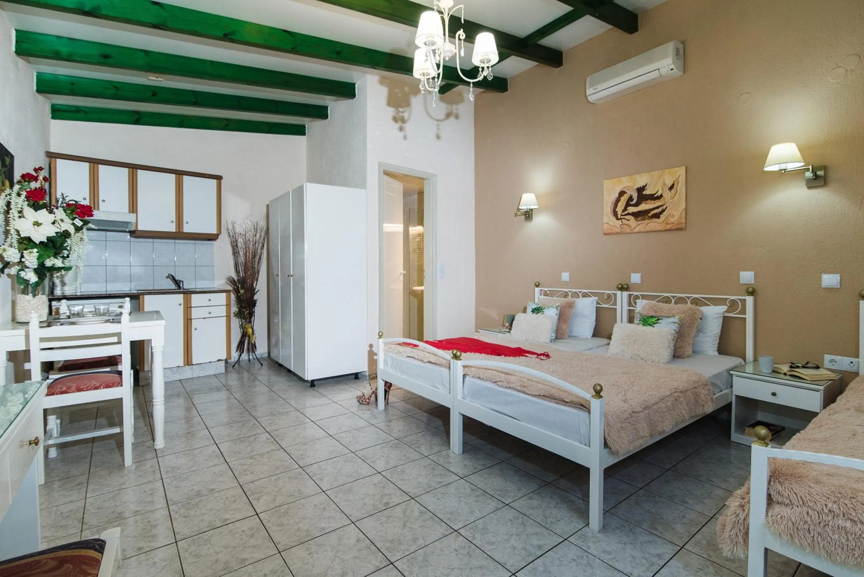 Photo of the whole room, Bed in Oasis Studios