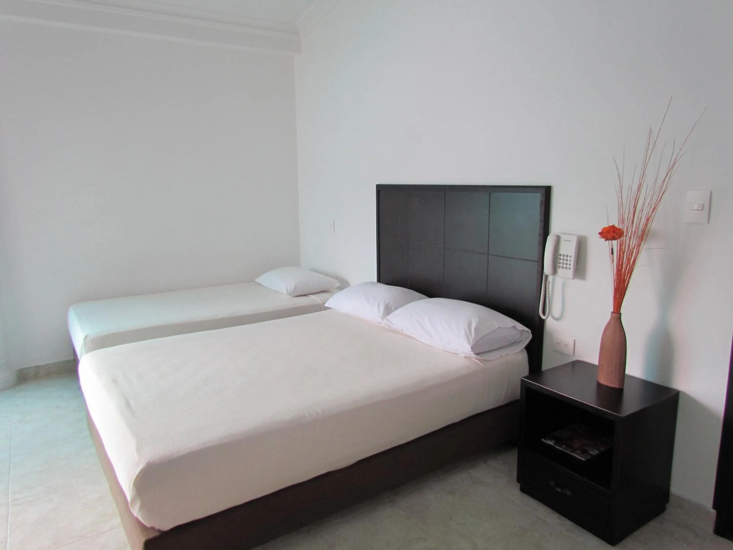 Bed in Hotel Iraqúa
