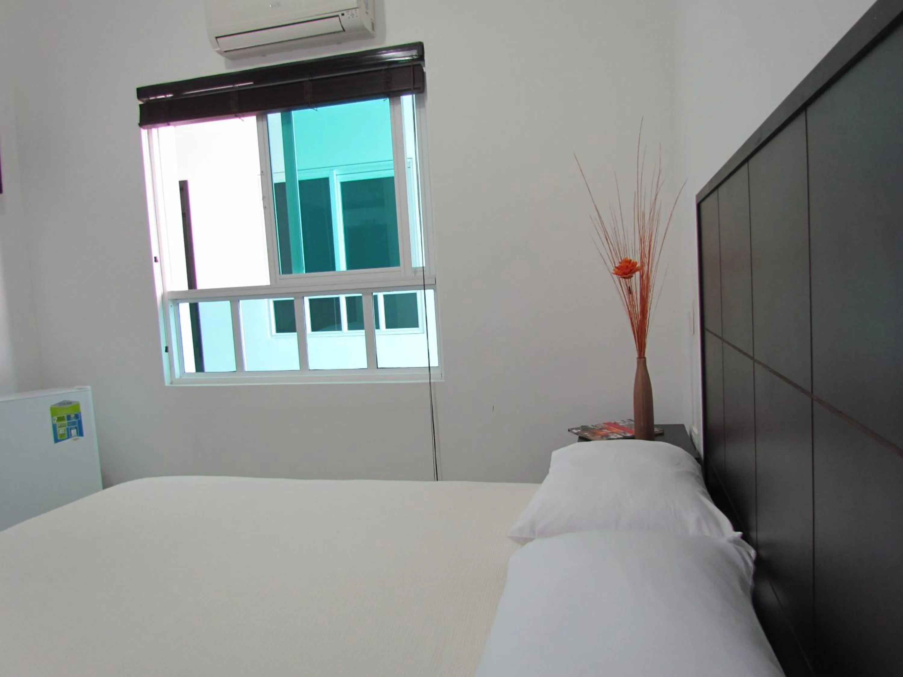 Bed in Hotel Iraqúa