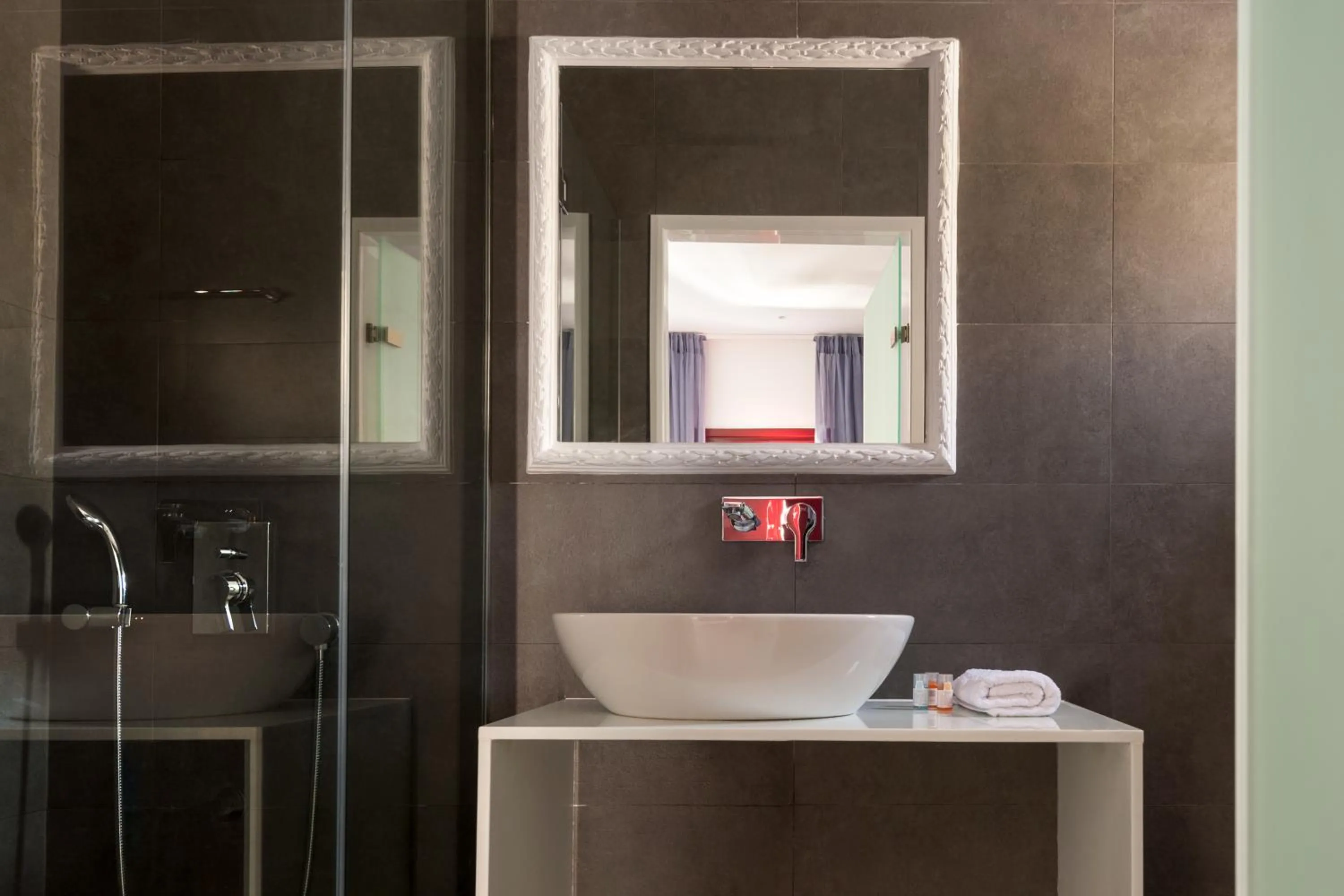 Bathroom in MAR n MAR CROWN HOTEL-SUITES