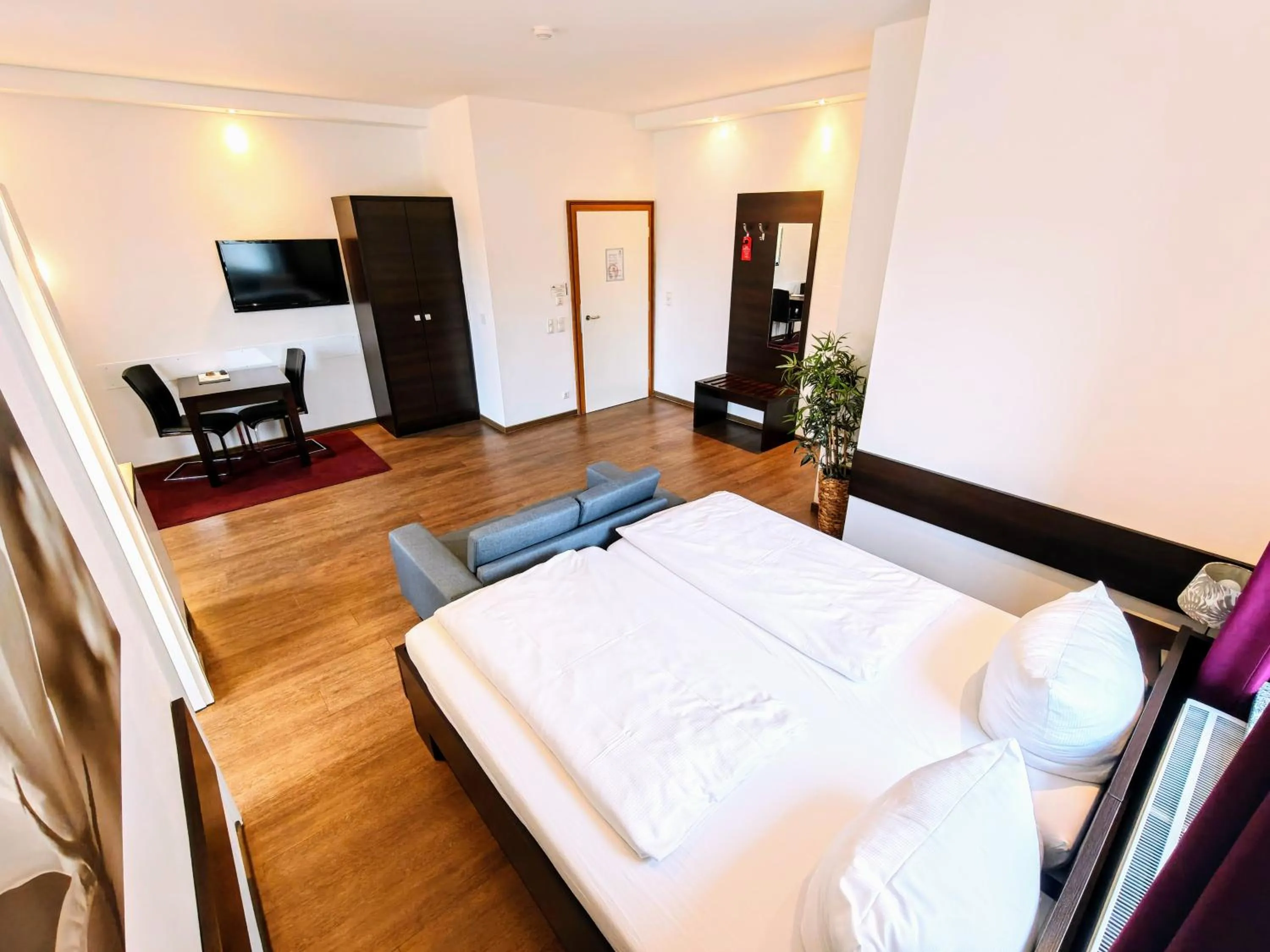 Bedroom, Bed in Aparthotel - Stadtvilla Premium