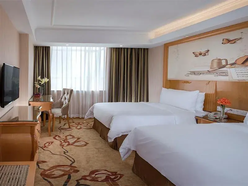 Bed in Vienna Hotel(Shenzhen Shajing Jingjinbaina Branch) Bed in Vienna Hotel(Shenzhen Shajing Jingjinbaina Branch)