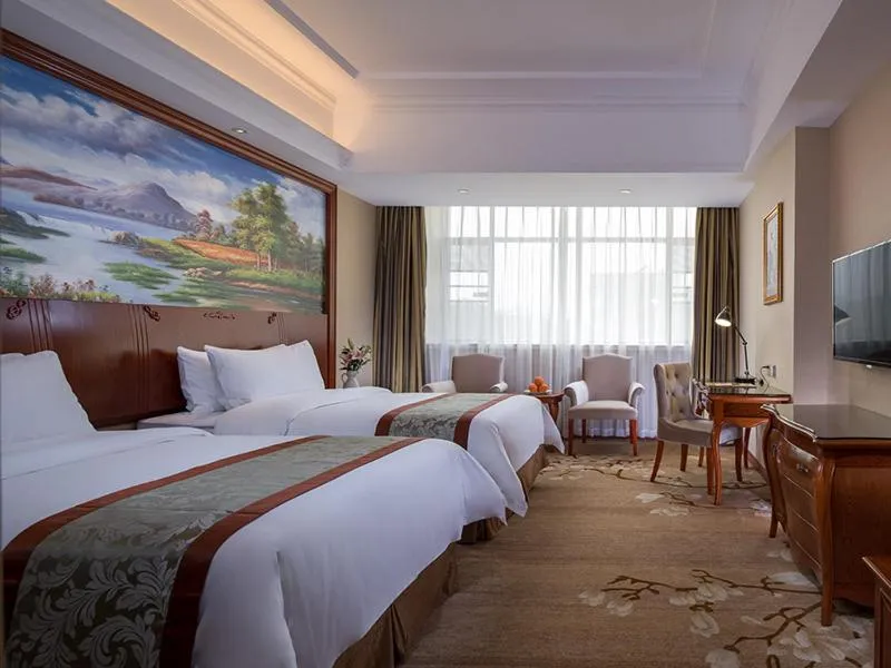 Bed in Vienna Hotel (Shaoguan Qujiang Shunjing)