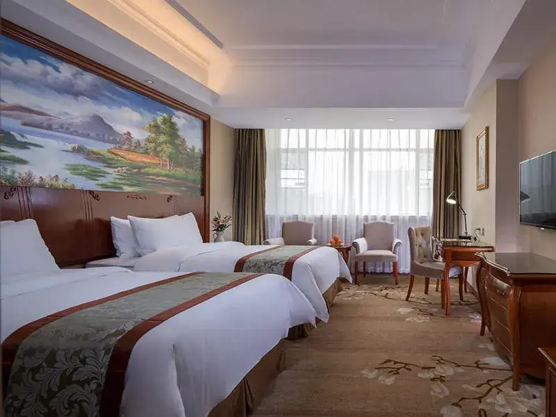 Bed in Vienna Hotel (Shaoguan Qujiang Shunjing) Bed in Vienna Hotel (Shaoguan Qujiang Shunjing)