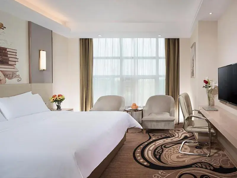 Bed in Vienna Hotel (East Plaza of WuHan High-Speed Railway Station) Bed in Vienna Hotel (East Plaza of WuHan High-Speed Railway Station)