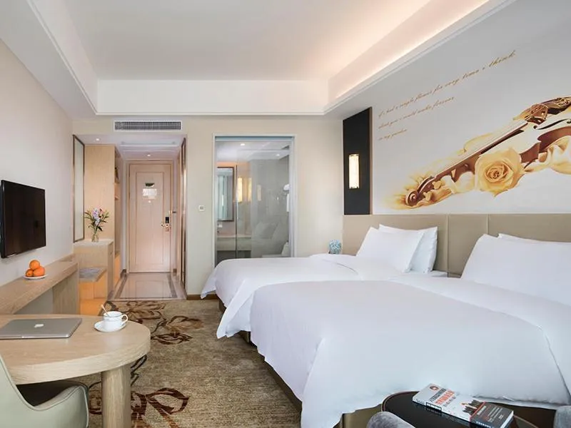 Bed in Vienna International Hotel (Changsha Ningxiang South Bus Station)