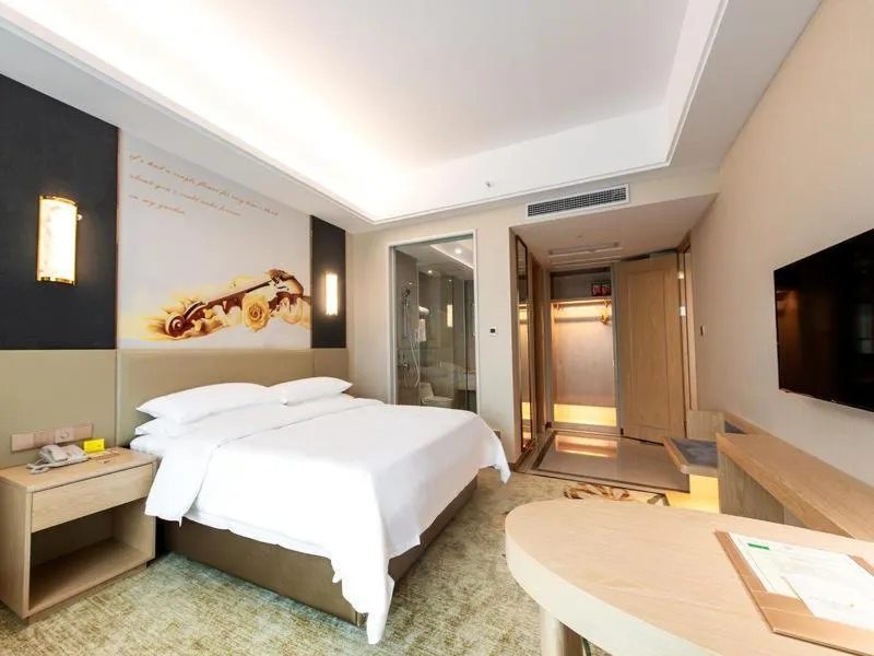 Bed in Vienna International Hotel (Changsha Ningxiang South Bus Station)