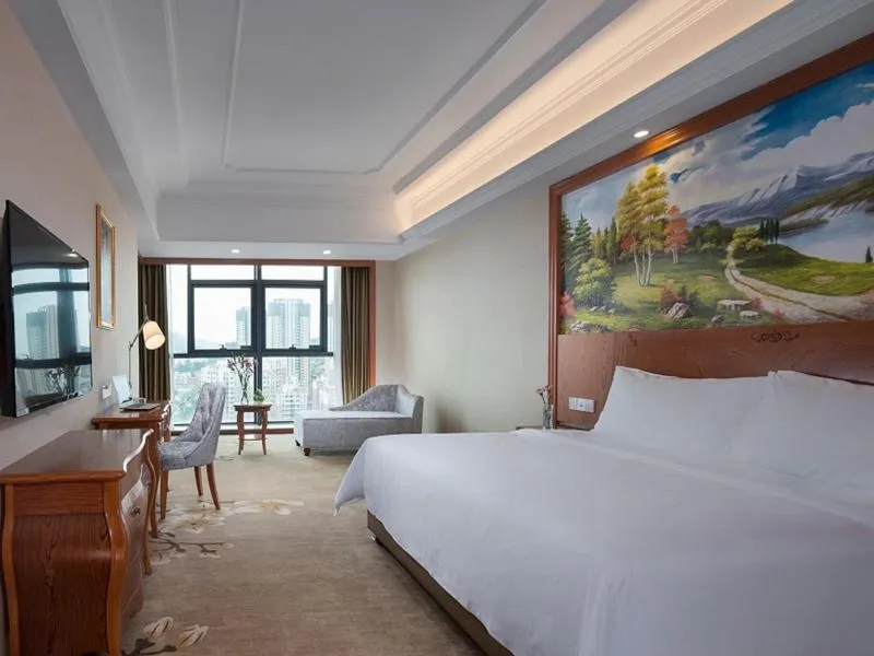 Bed in Vienna International Hotel(Jinjiang Jordan Center)
