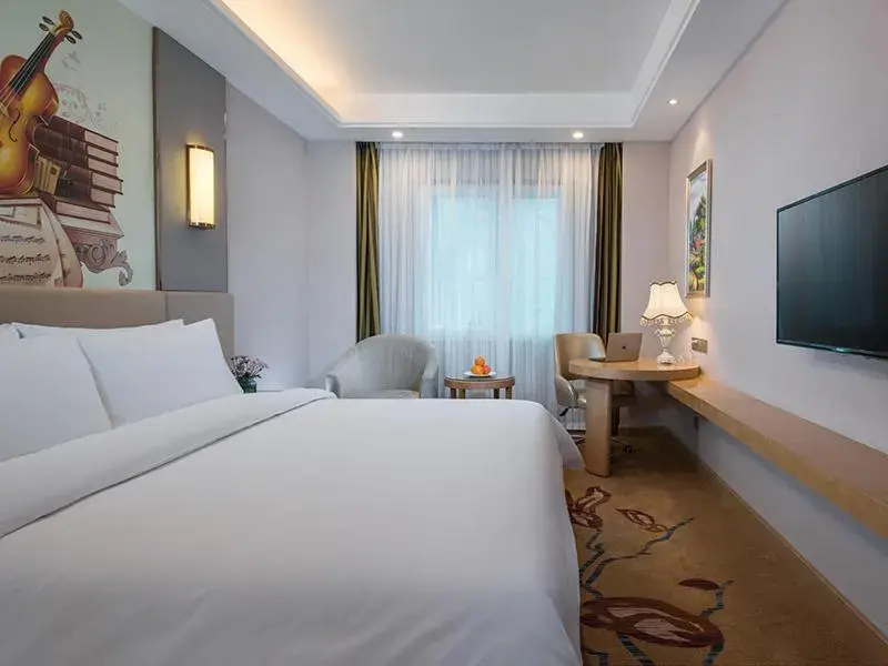 Bed in Vienna International Hotel(Hangzhou Xihu Fengshan Road Station) Bed in Vienna International Hotel(Hangzhou Xihu Fengshan Road Station)