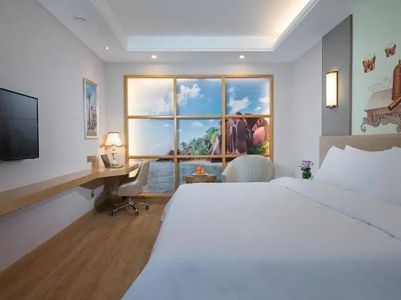 Bed in Vienna International Hotel(Hangzhou Xihu Fengshan Road Station) Bed in Vienna International Hotel(Hangzhou Xihu Fengshan Road Station)