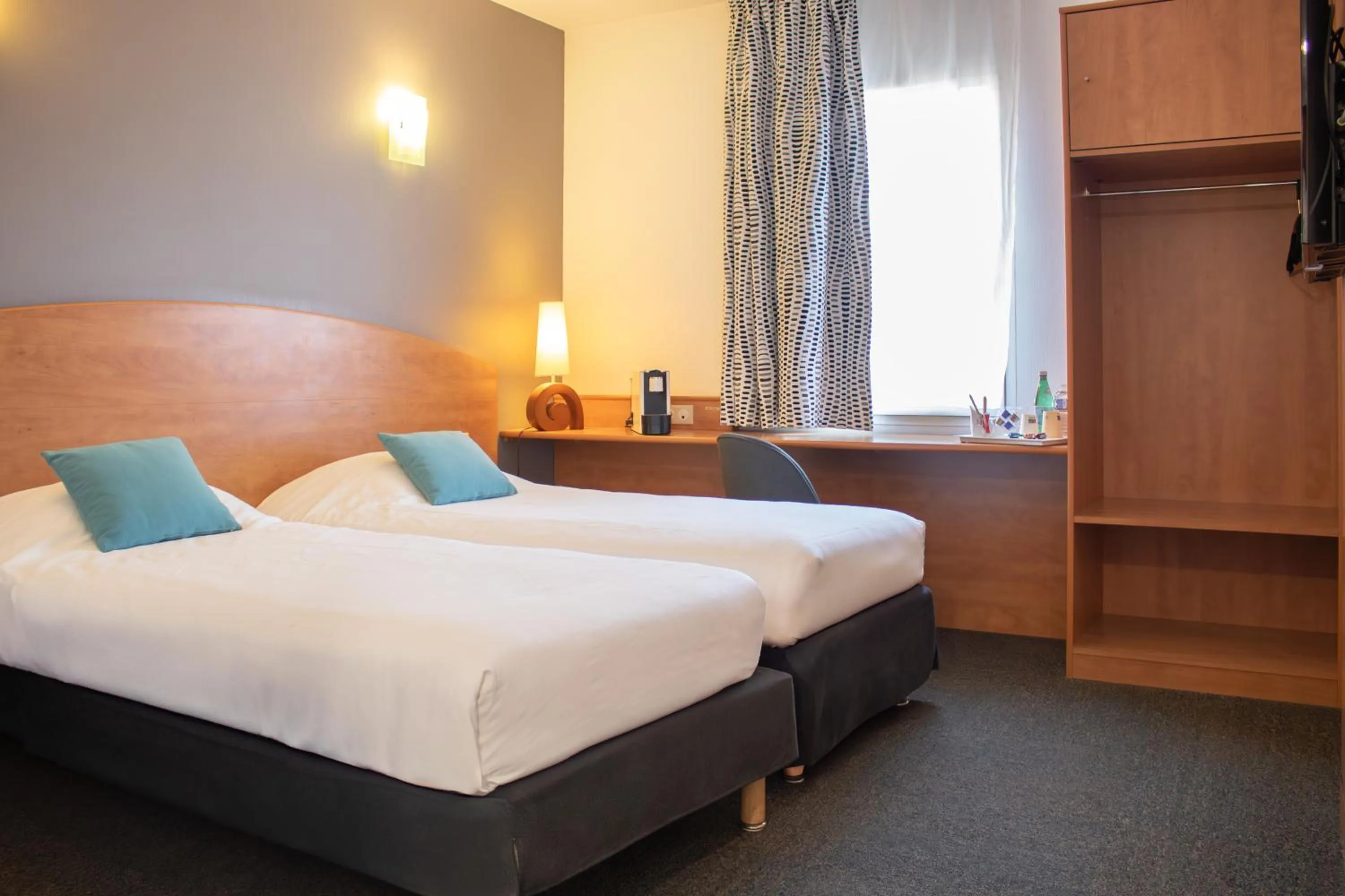 Photo of the whole room, Bed in Brit Hotel Bressuire