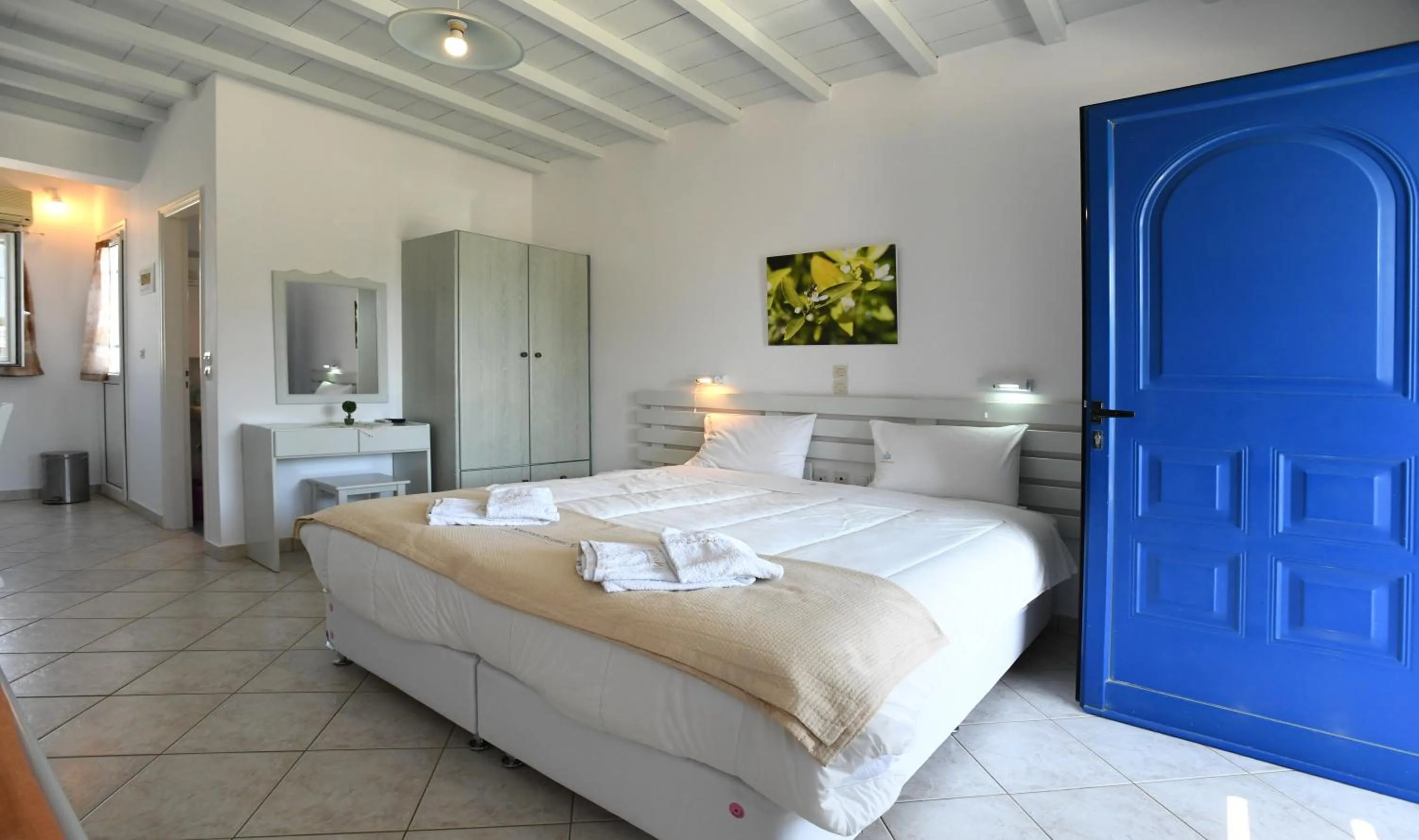 Bed in Nostos Beachfront Apartments & Studios