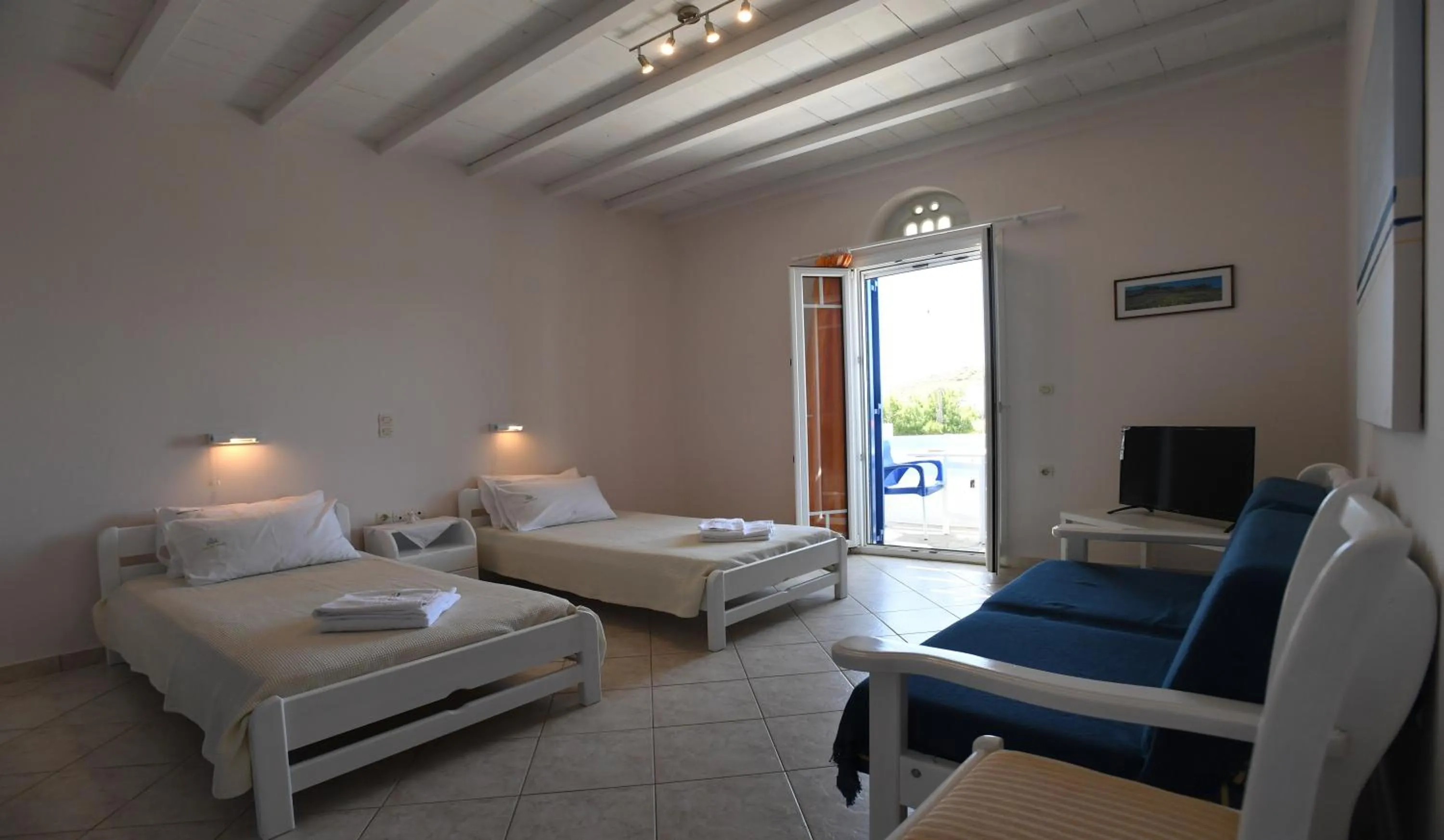 Bed in Nostos Beachfront Apartments & Studios