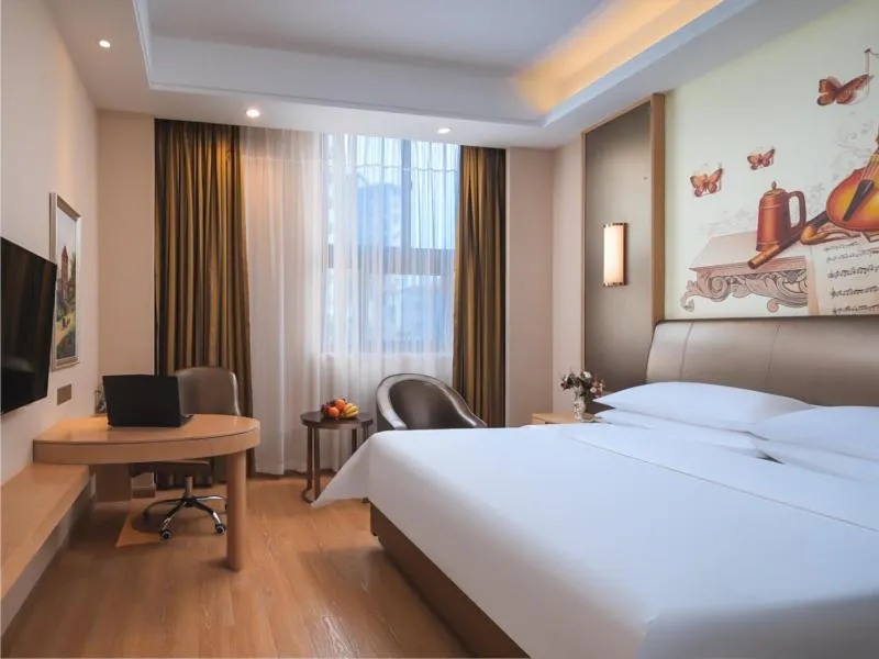 Bed in Vienna Hotel (Shanghai jinshanwei Railway Station City Beach Shop)