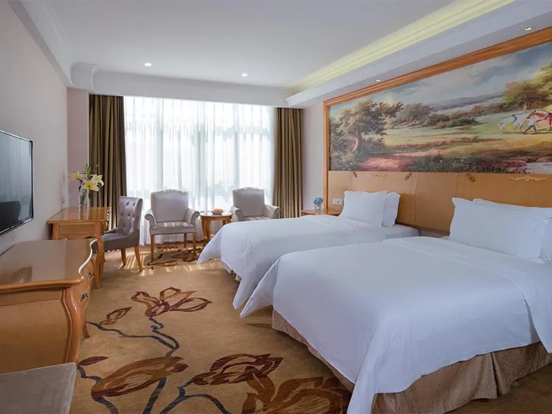 Bed in Vienna International Hotel Maoming Wanda Plaza
