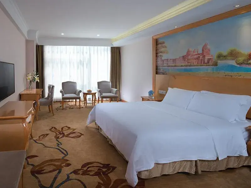 Bed in Vienna International Hotel Maoming Wanda Plaza Bed in Vienna International Hotel Maoming Wanda Plaza