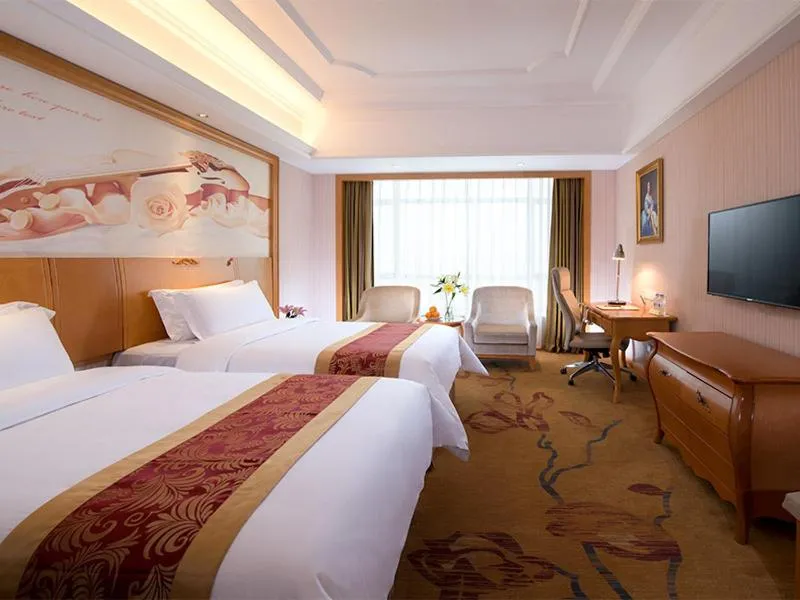 Bed in Vienna International Hotel Maoming Wanda Plaza