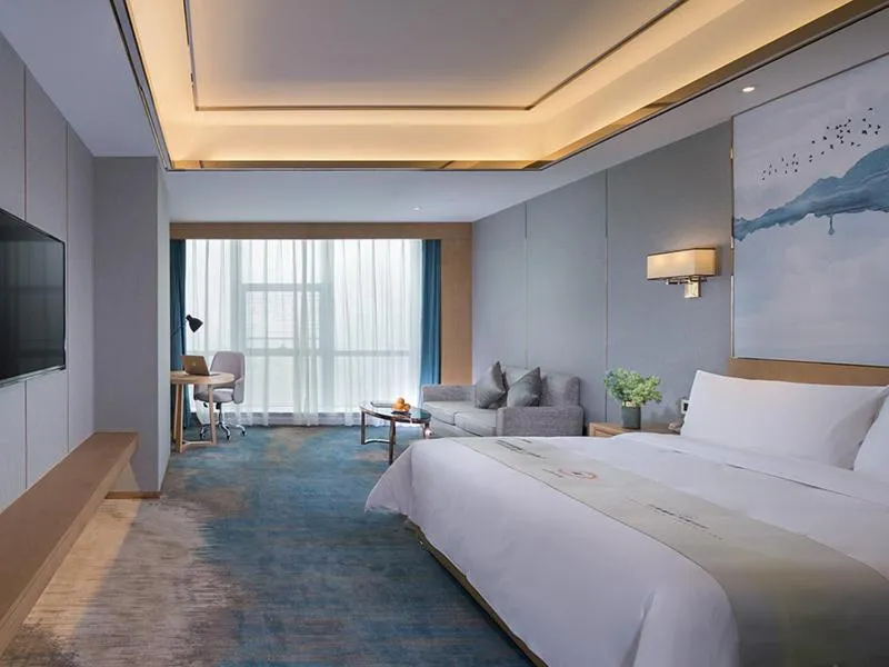 Bed in Venus Royal Hotel(Foshan Kuiqi Road Metro Station)