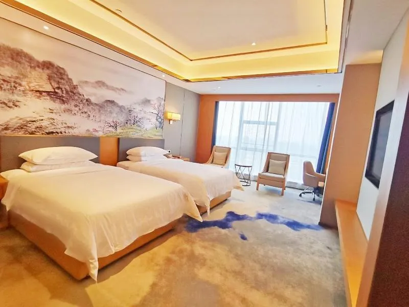 Bed in Venus Royal Hotel(Foshan Kuiqi Road Metro Station)