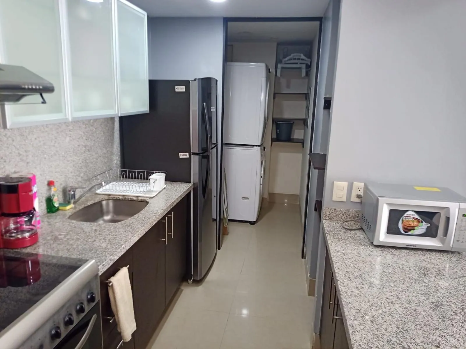 Kitchen or kitchenette in Puerta Alameda Suites México