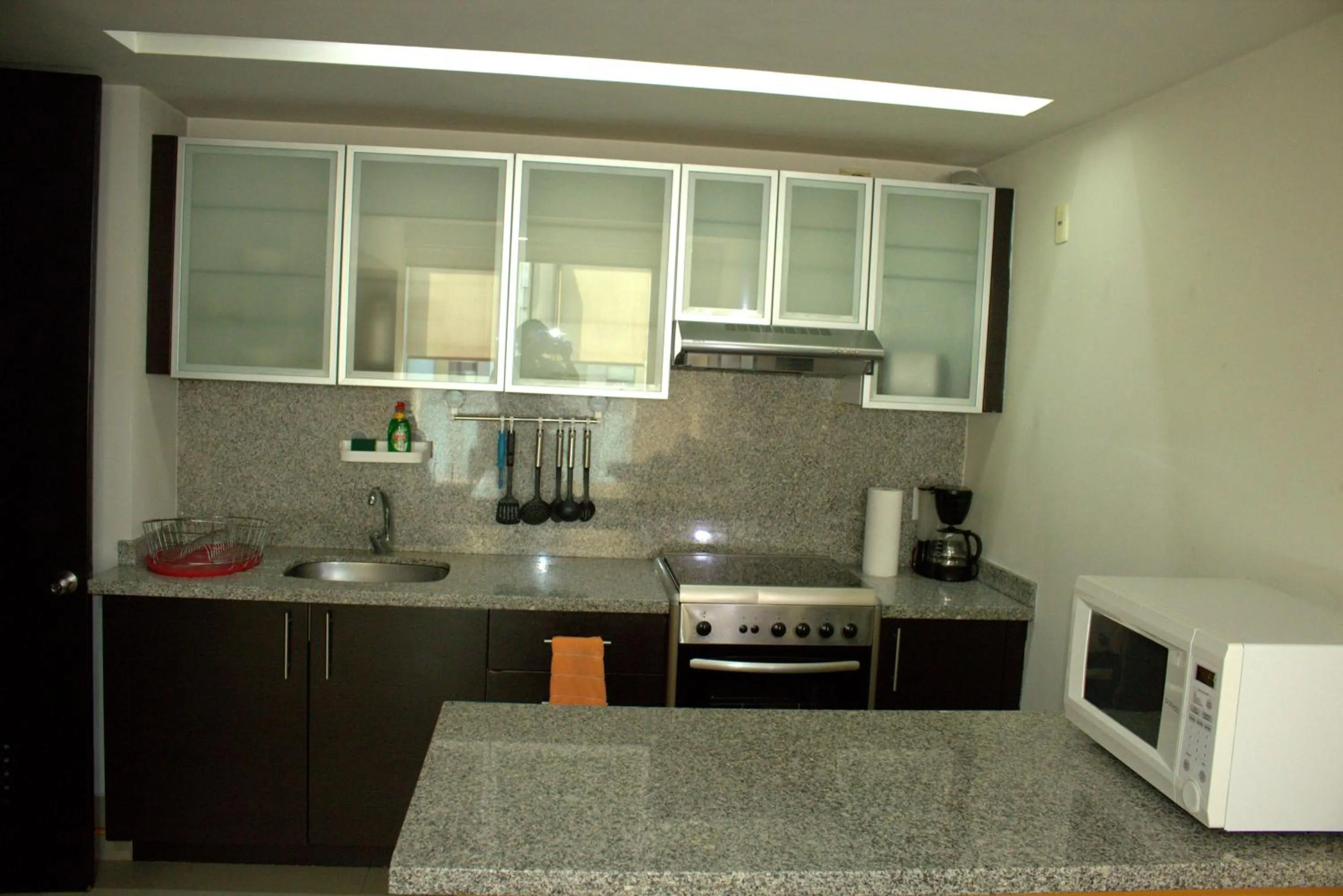 Kitchen or kitchenette in Puerta Alameda Suites México