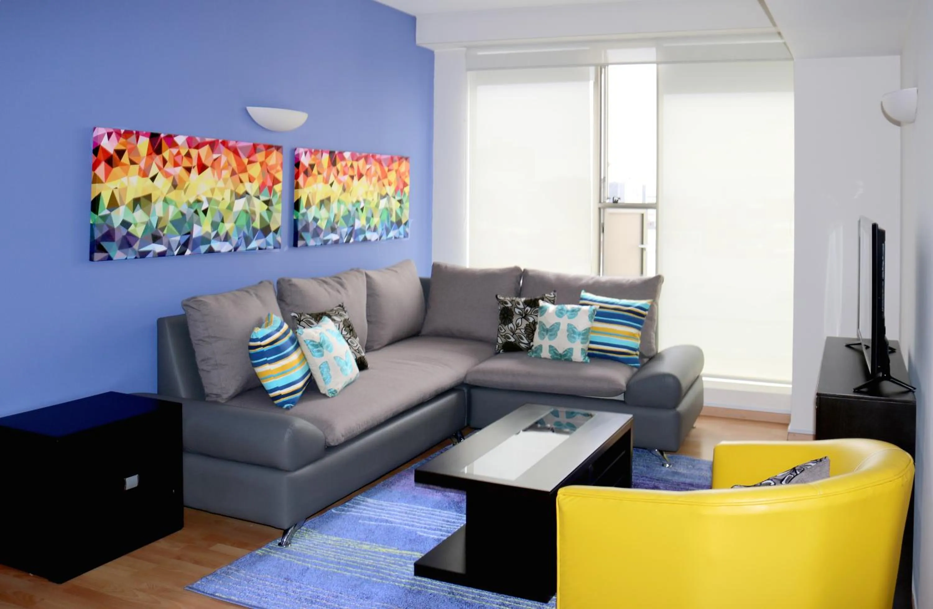 Living room in Puerta Alameda Suites México