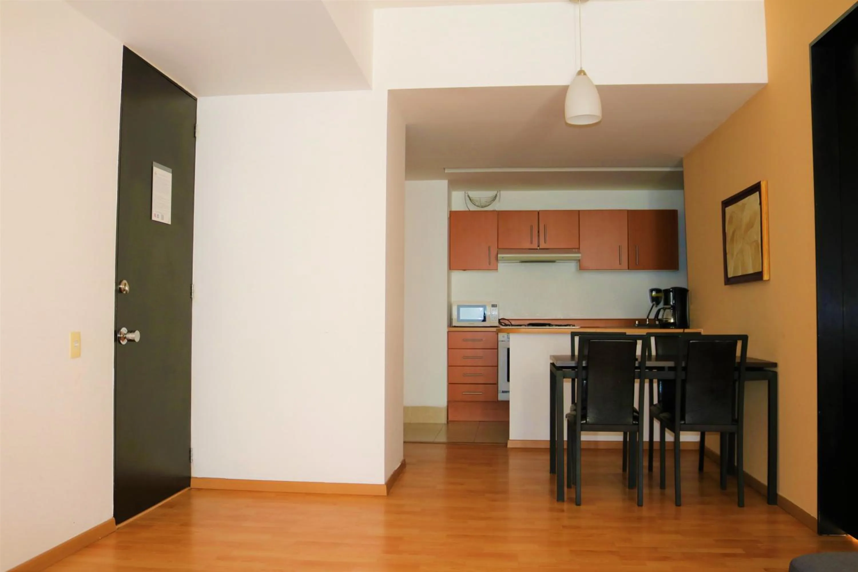 Kitchen or kitchenette in Puerta Alameda Suites México