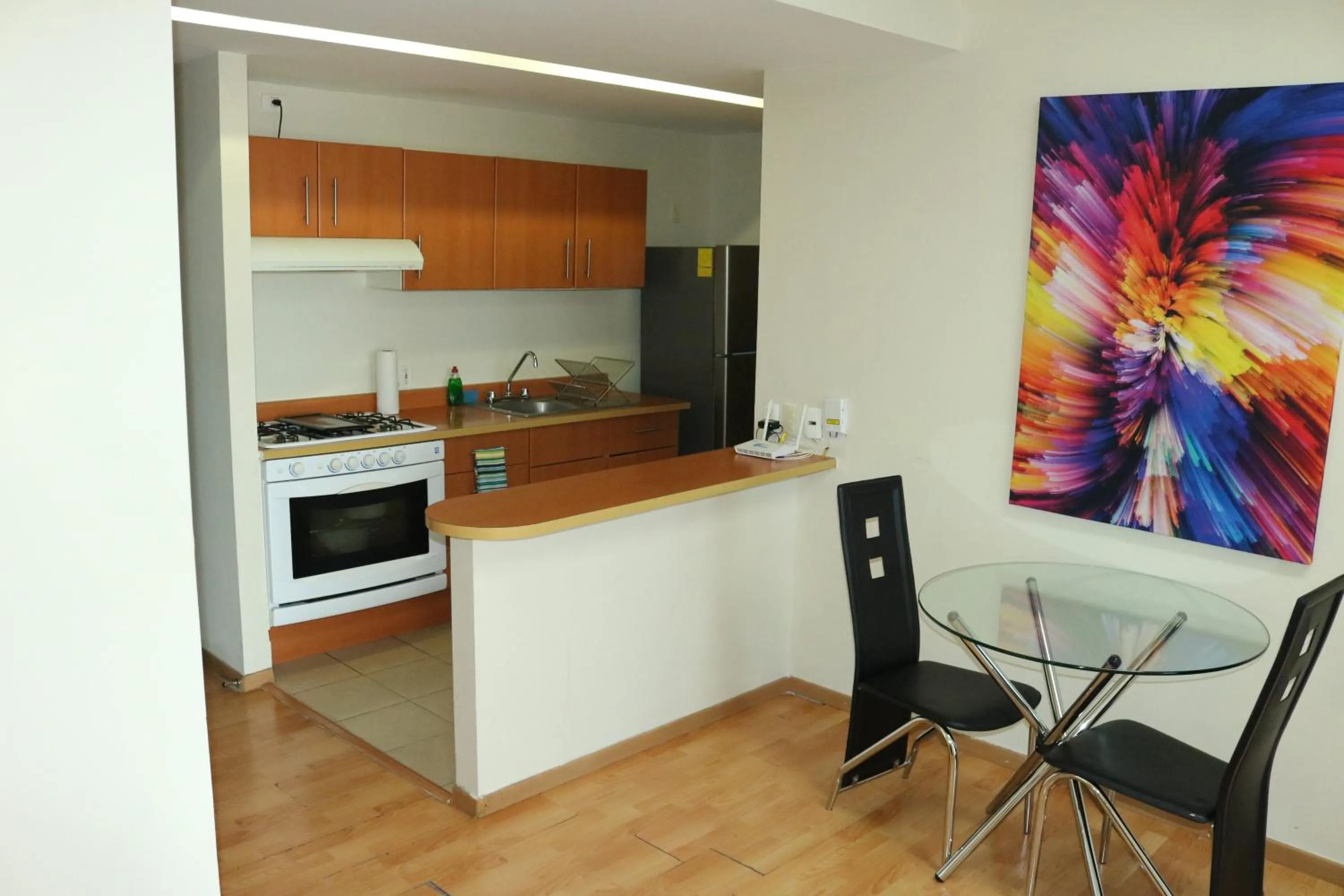 Kitchen or kitchenette in Puerta Alameda Suites México