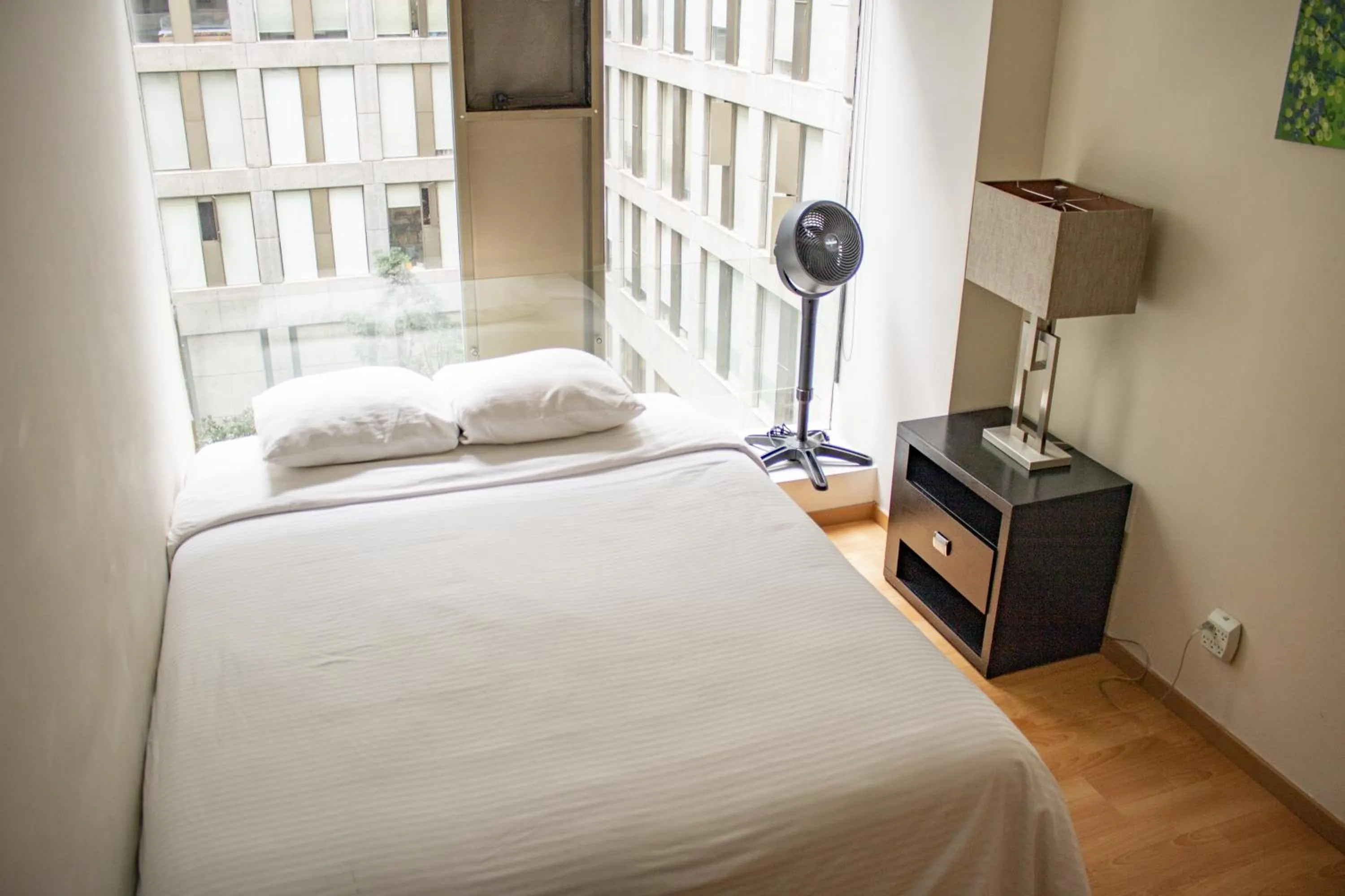 Bed in Puerta Alameda Suites México