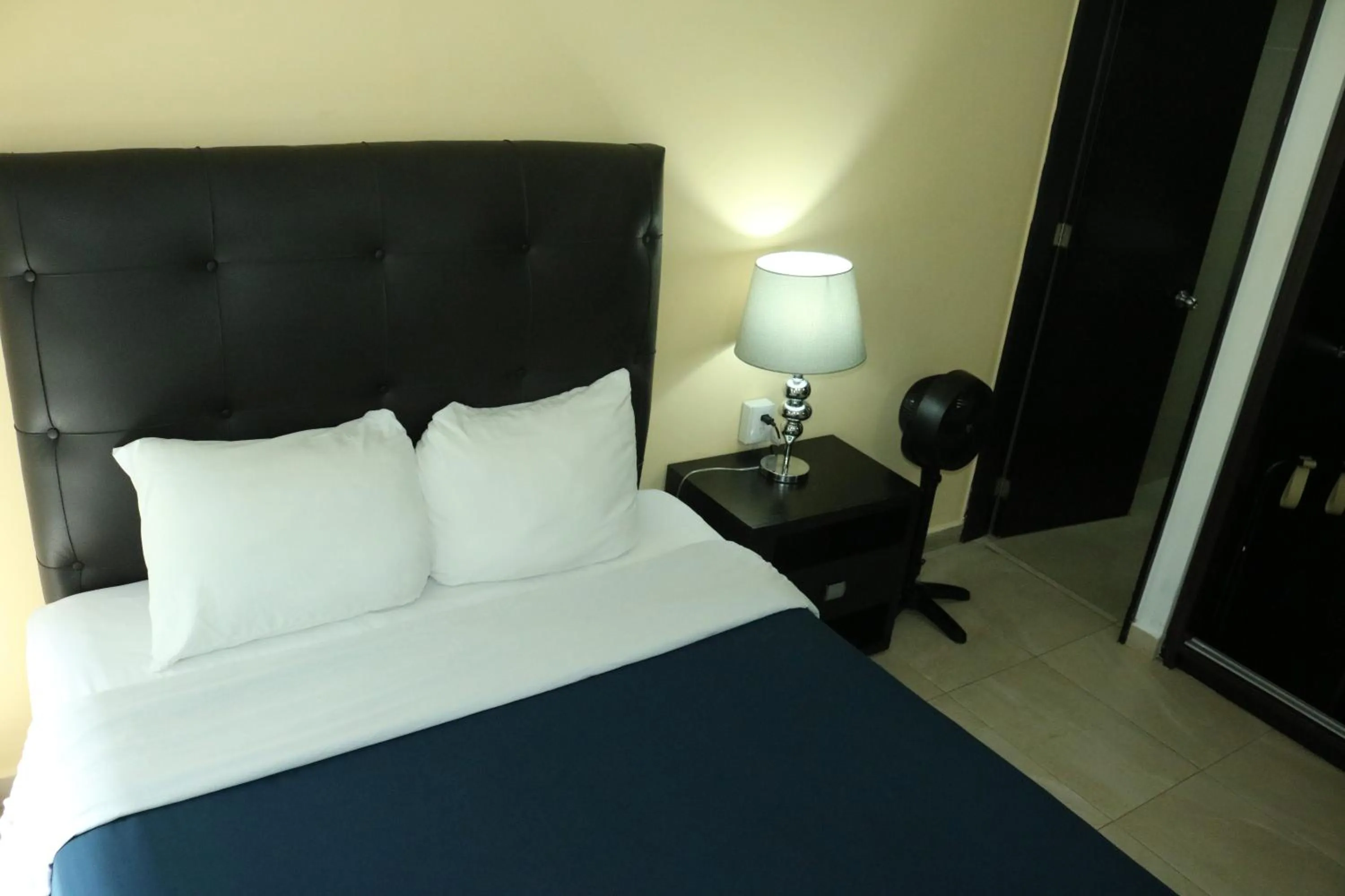 Bed in Puerta Alameda Suites México