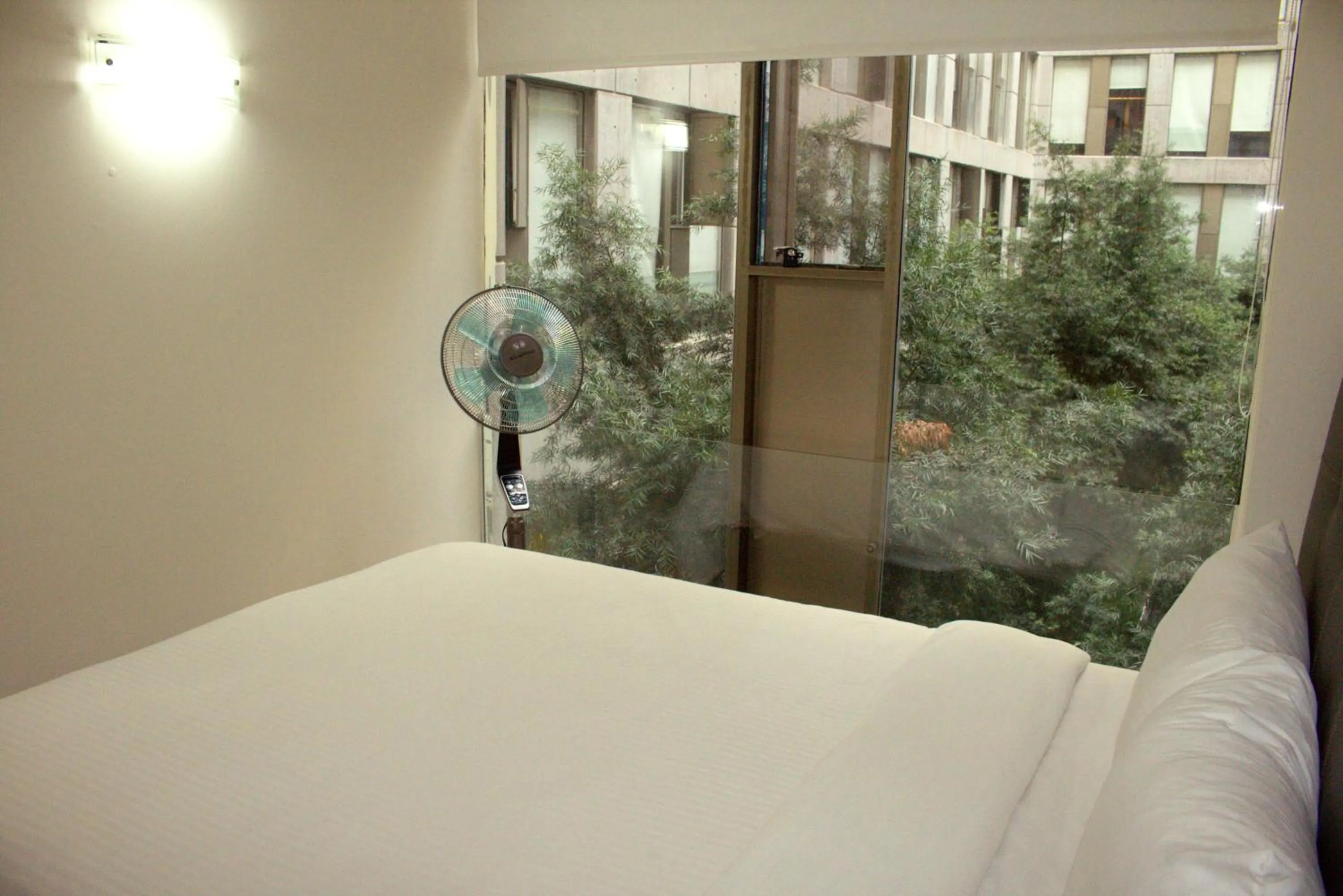 Bed in Puerta Alameda Suites México